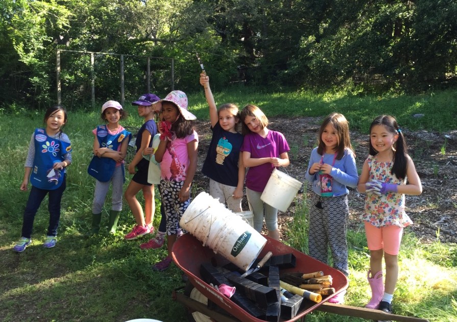 The Los Altos Daisy troop poses for a photo after planting at Redwood Grove. Photo credit Stacey Dixon.