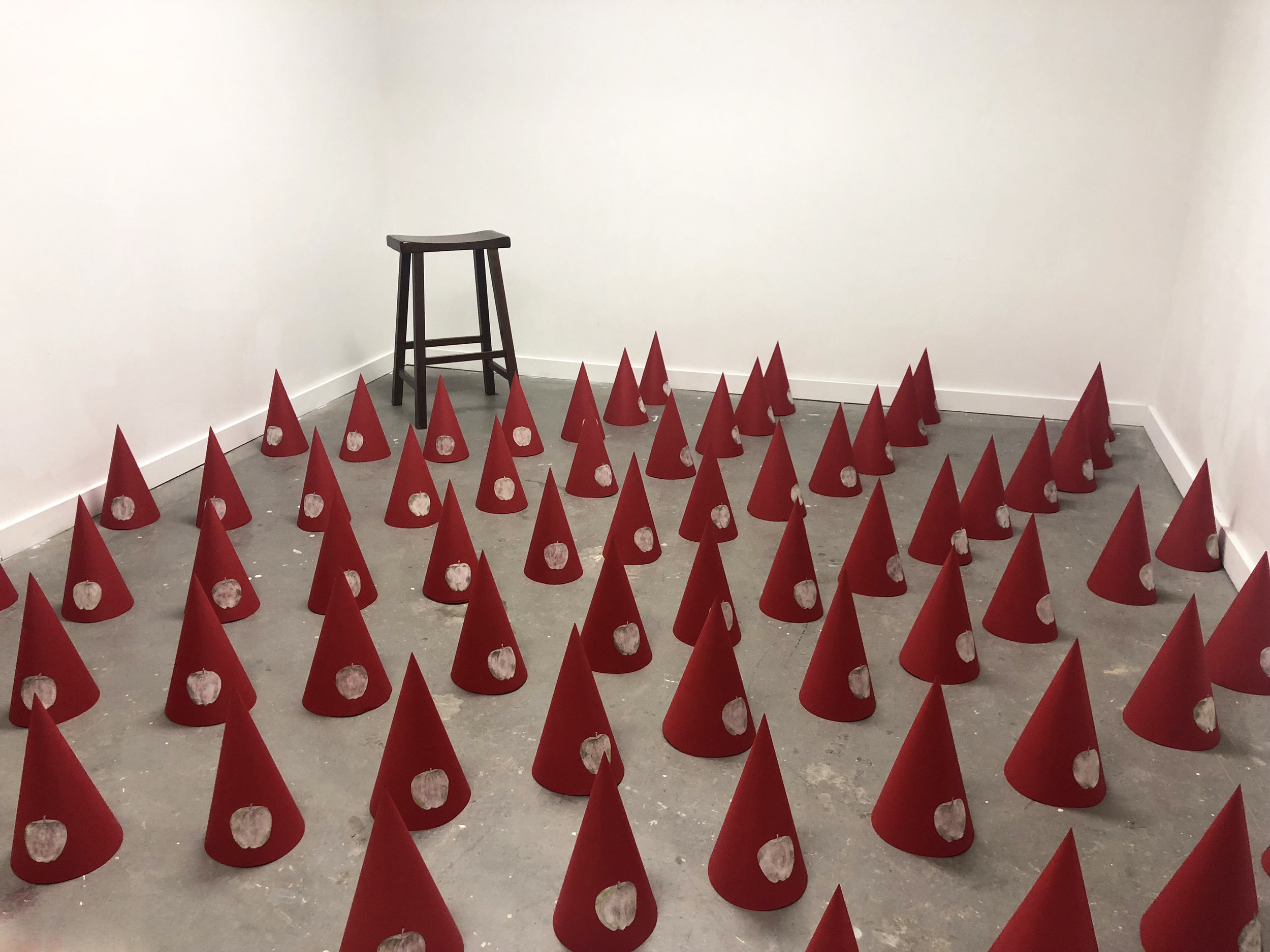  Student: Lu Colby Project: “Color Lithography” (Advanced Print: Lithography) Site-specific installation: Stone lithography, handmade dunce caps, found stool.  96”x96” 