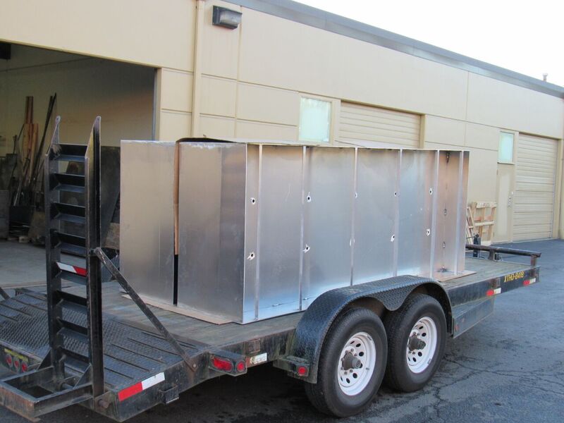 Aluminum planters off to get coated.