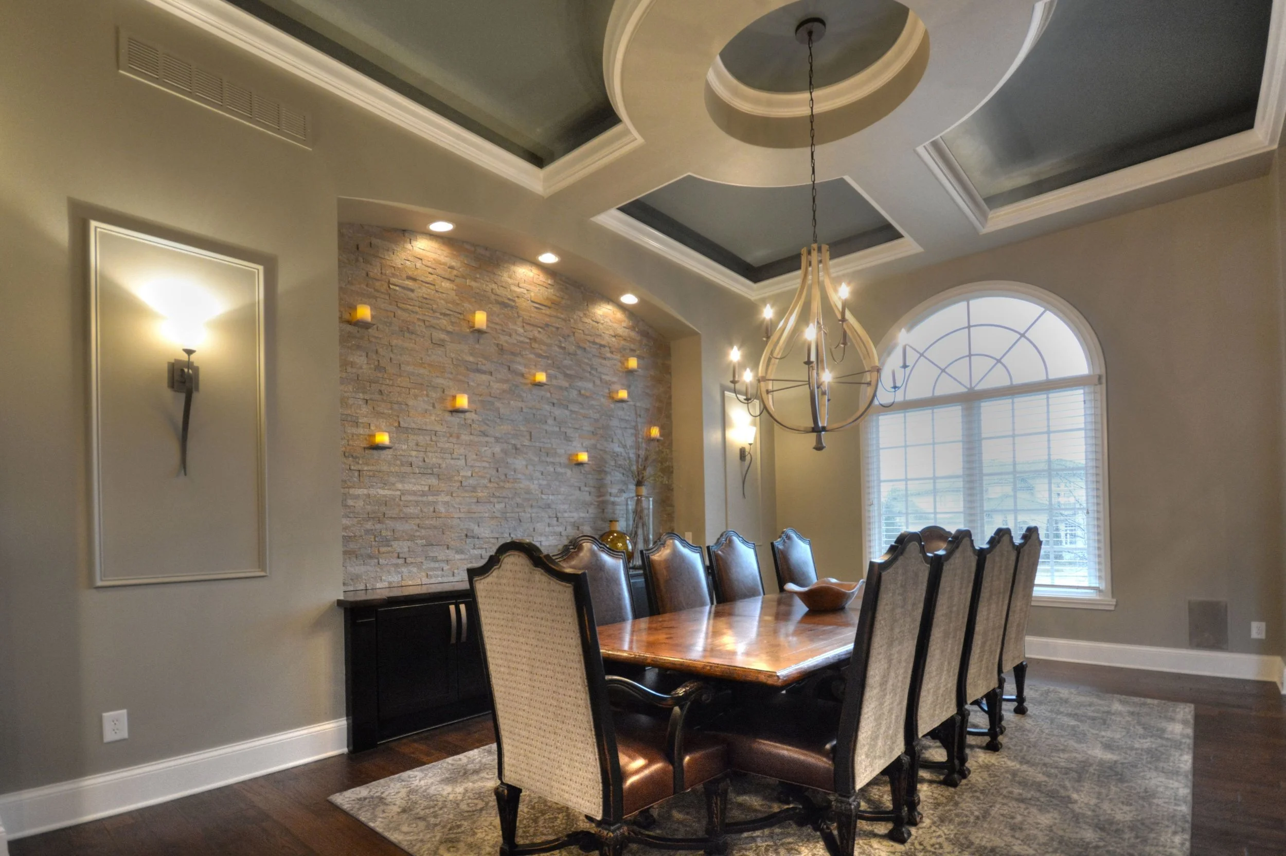 AFTER: Newly renovated dining room pictured above. BEFORE: Original dining room, with red paint, pictured below.