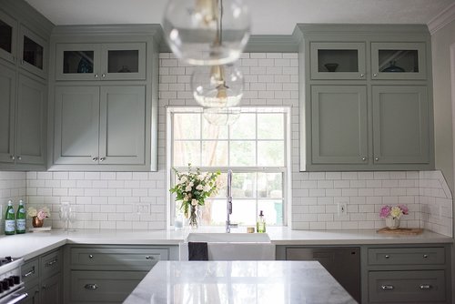 Cambridge Row: Super White Quartzite Kitchen Island. Photo by Melissa Parsons.