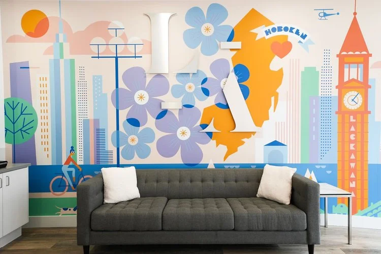 Large-scale custom wall mural by Kirsten Ulve installed in a LaserAway clinic interior