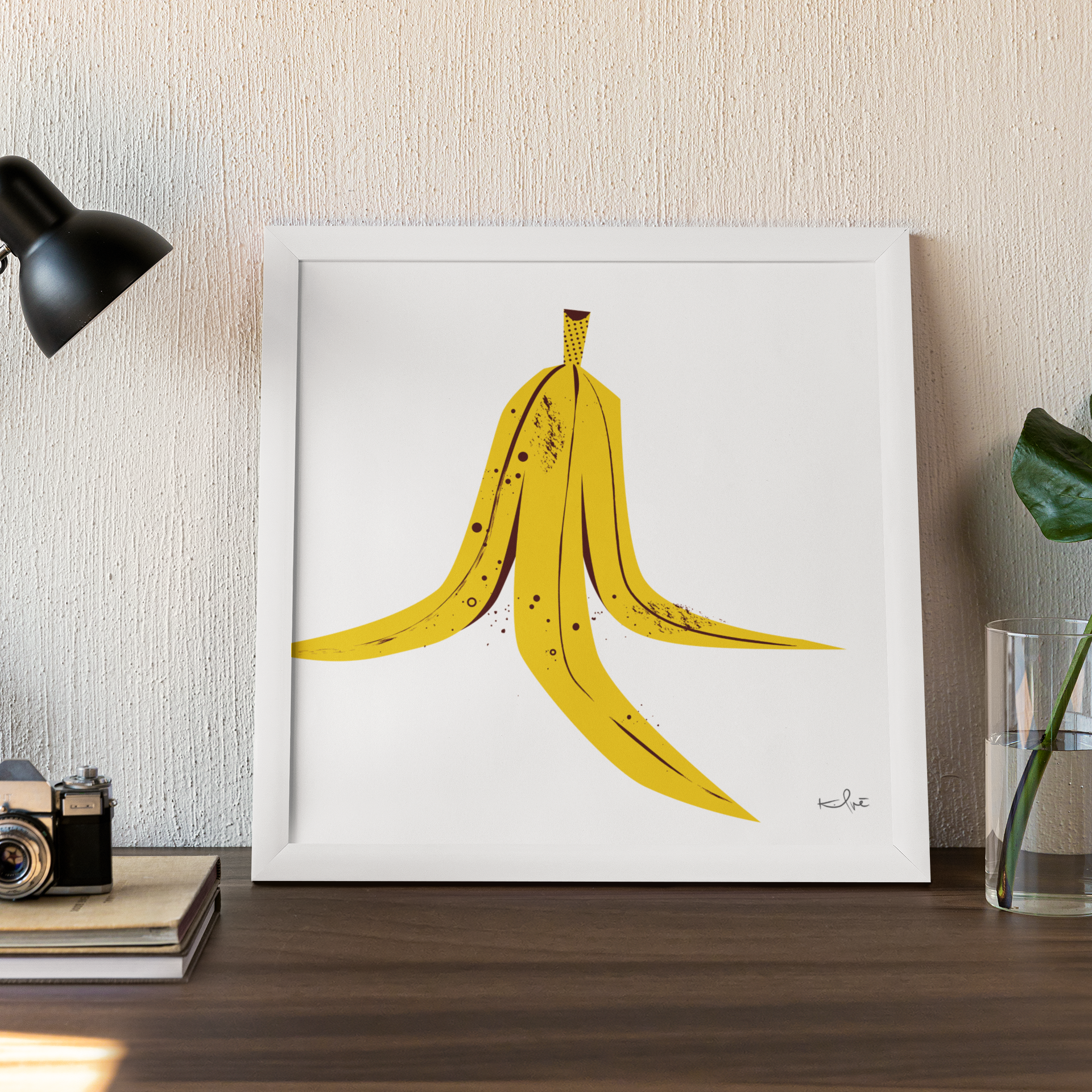 Banana Peel Archival Art Print – Minimal Yellow Graphic Illustration in Framed Tabletop Display.png