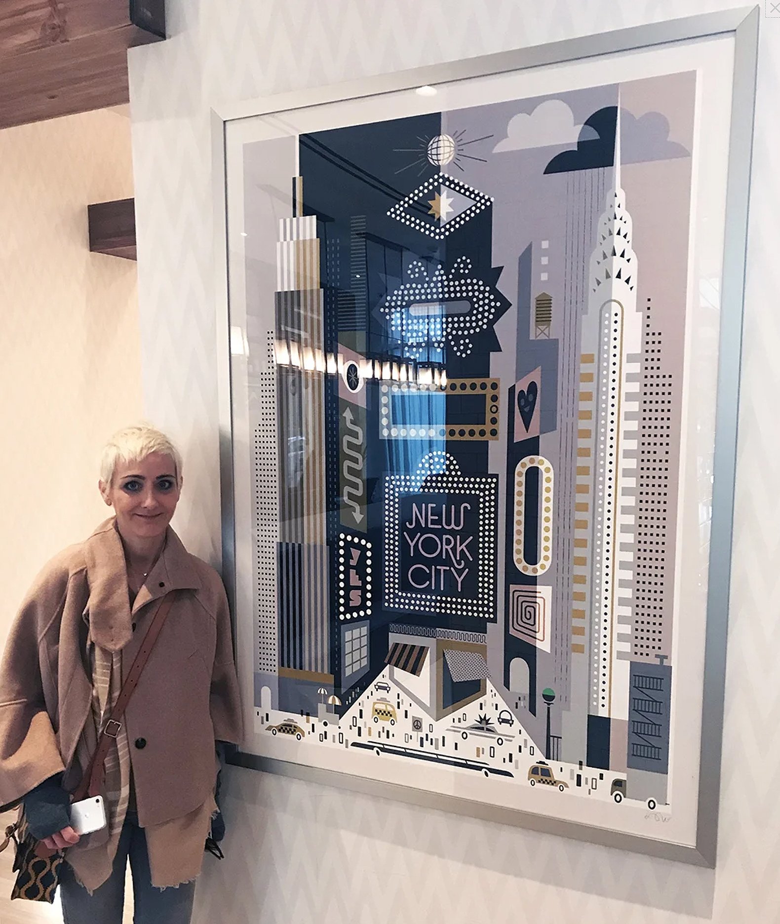 Large-scale framed illustration by Kirsten Ulve installed at INNSiDE by Meliá Hotel in Times Square, New York City