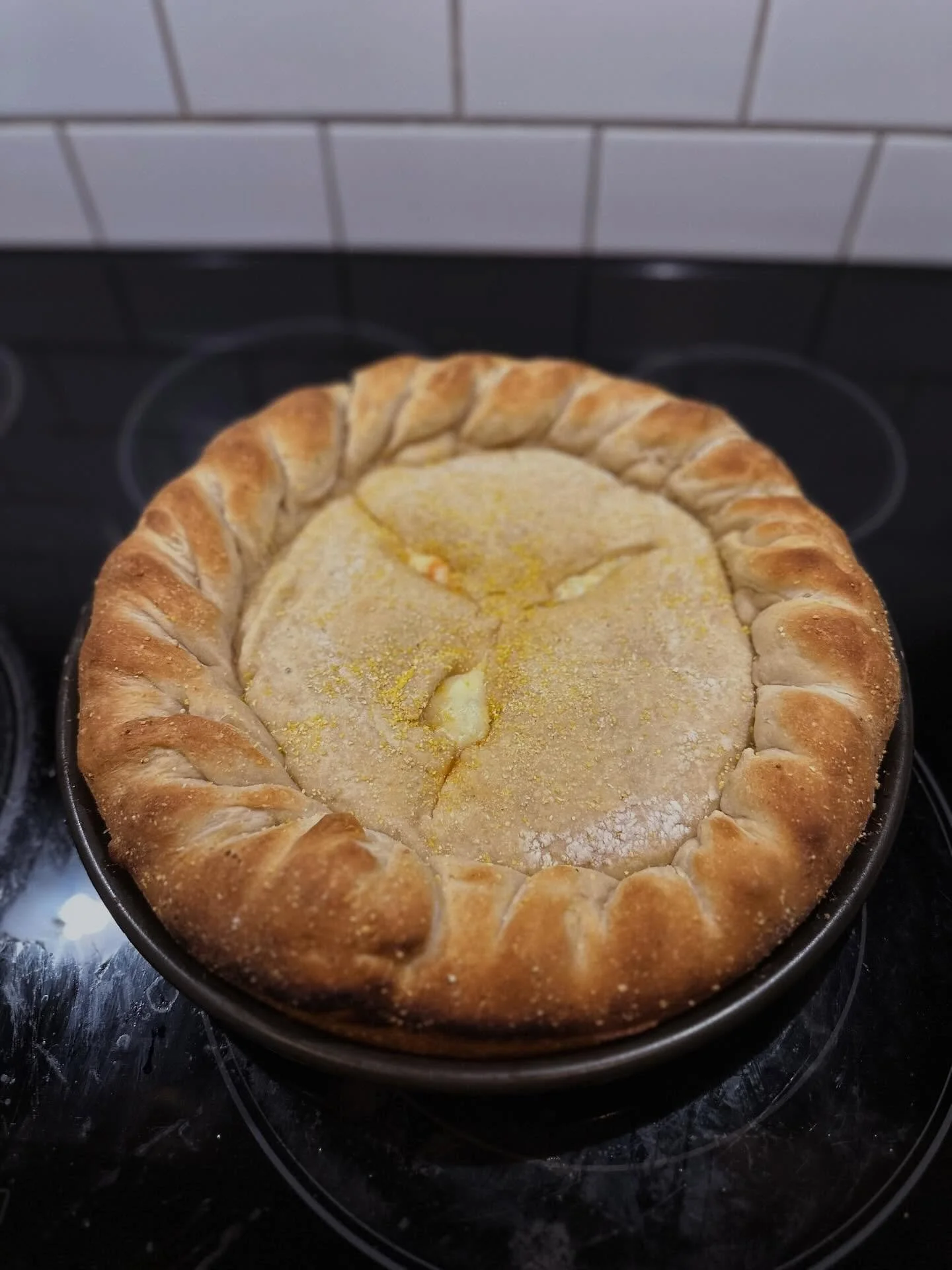 First attempt at a stuffed pizza. Looks good on the outside! #pizza