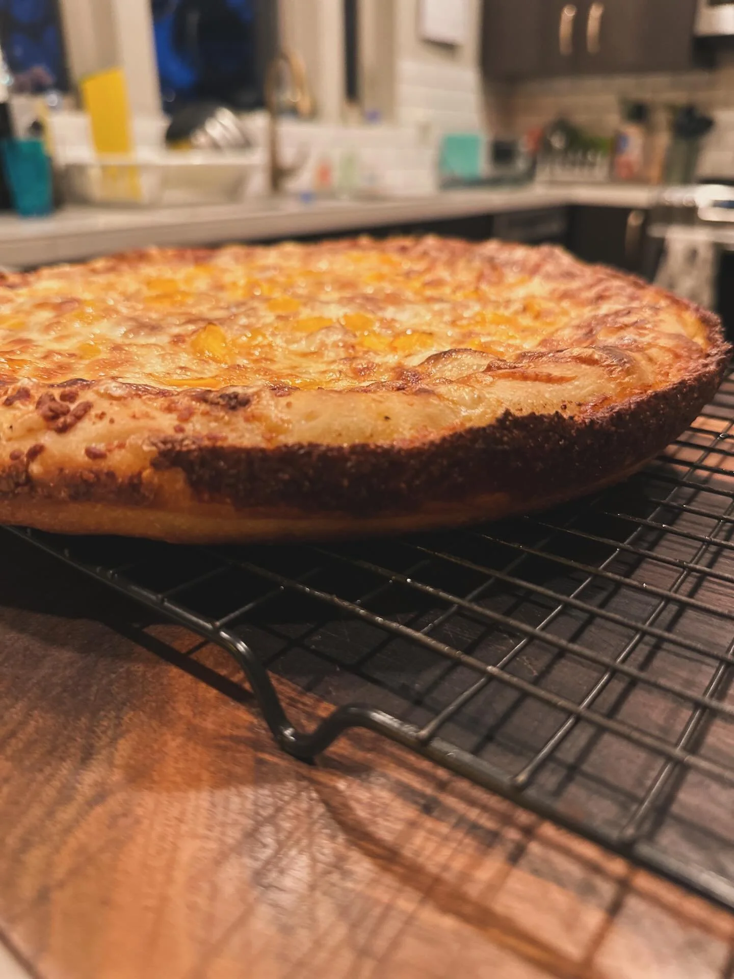 Added some leftover cheese curds on part of the crust. Definitely a smart choice! #pizza