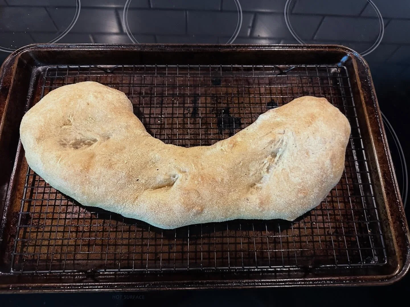 First attempt at ciabatta! Not the prettiest but it smells amazing 🤤