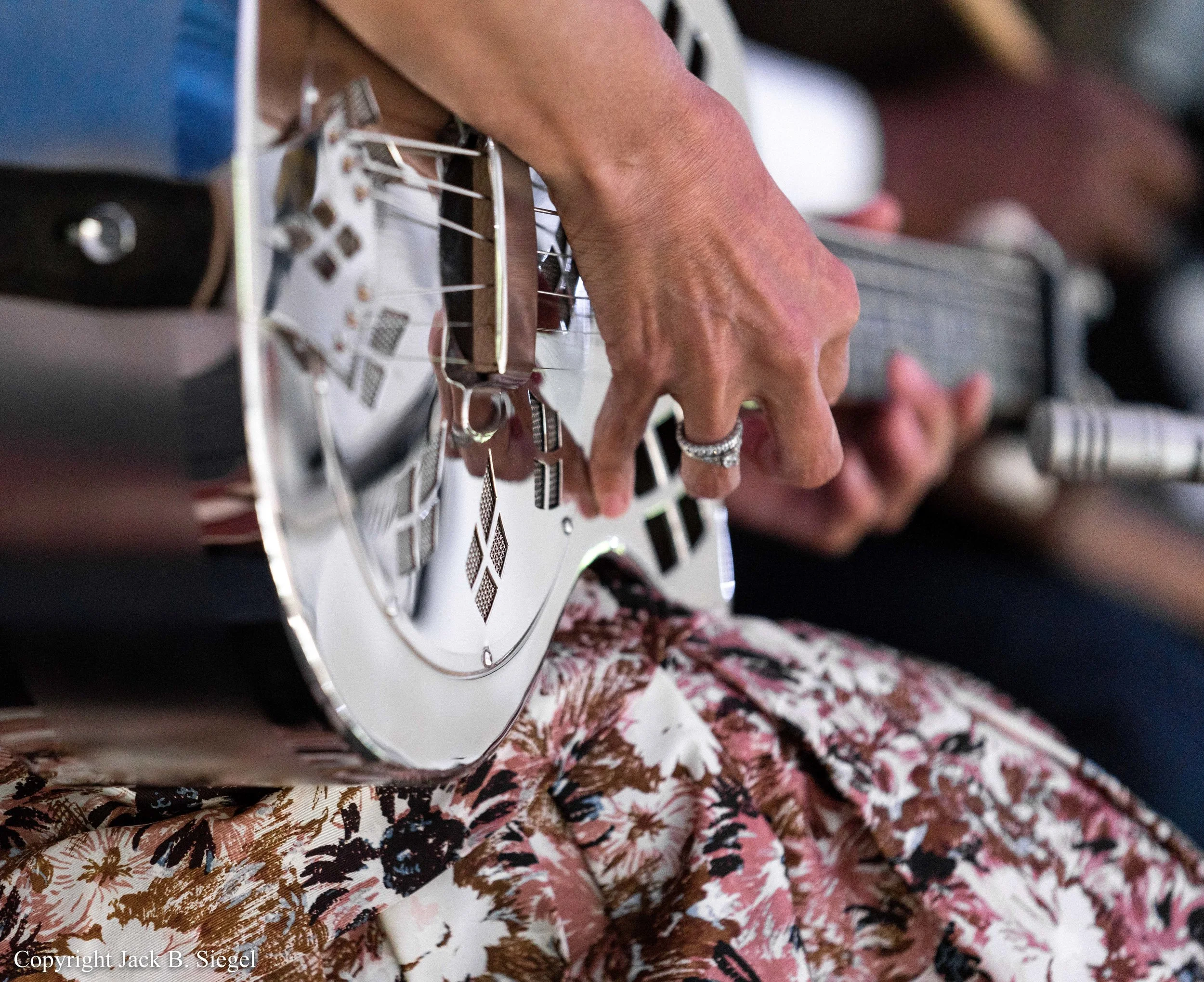 _DS28963PS__Copyright_Dobro Guitar and Hands.jpg