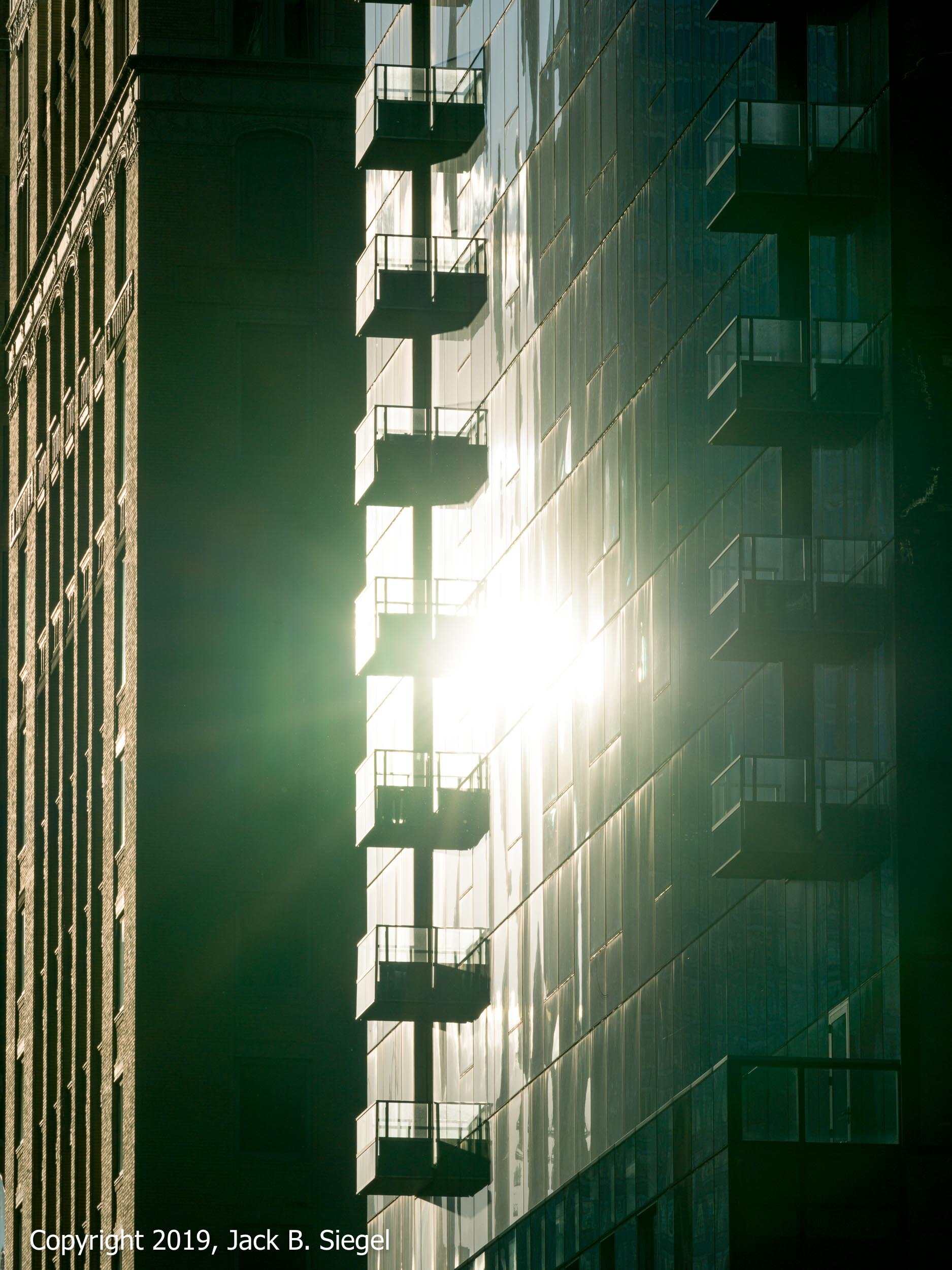 The Sun Has Begun Its Visible Descent (NW Corner of Michigan Avenue and Lake Street)