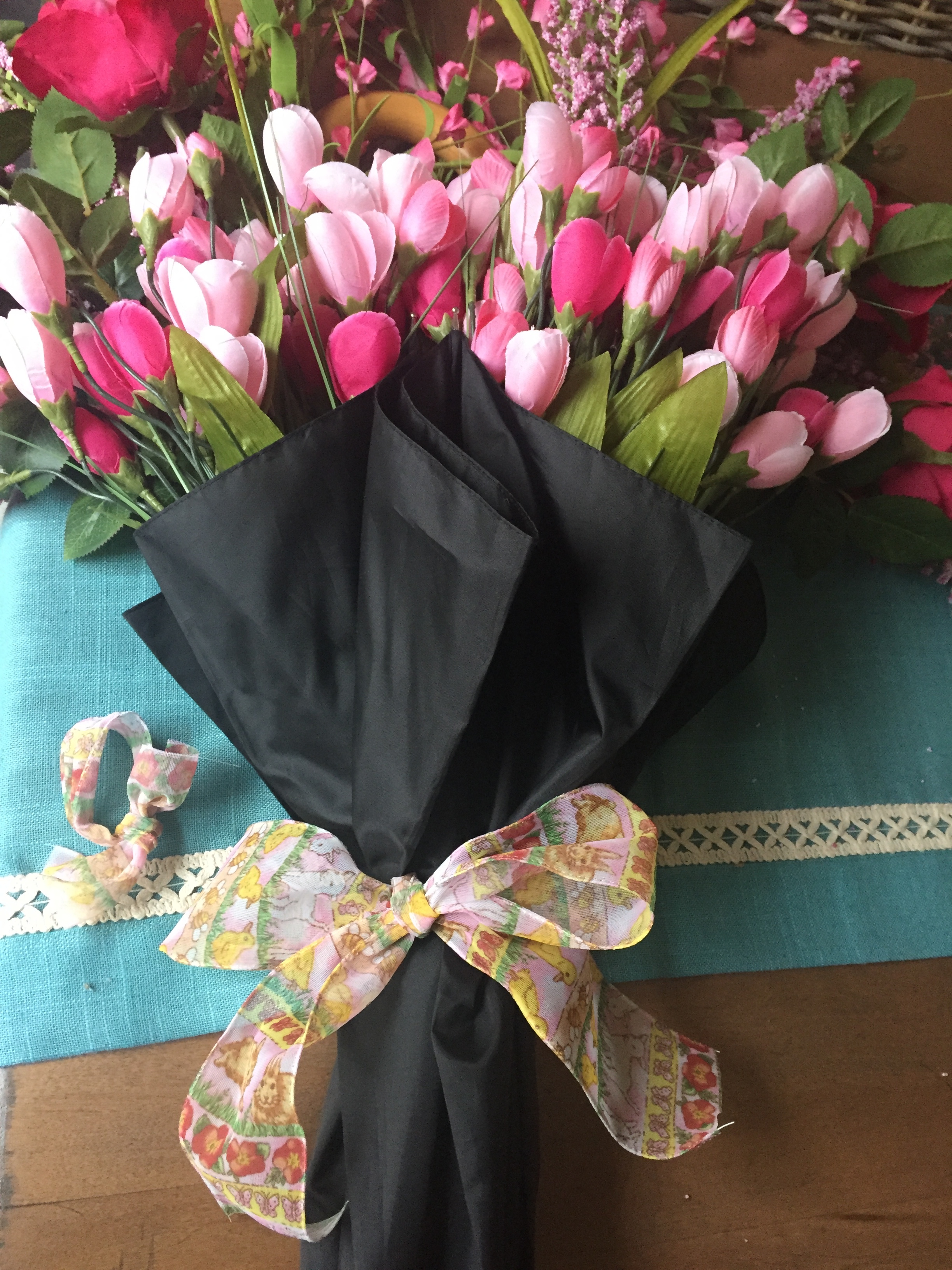 STEP 7: Cut some coordinating ribbon to tie around the umbrella to hold it all together.