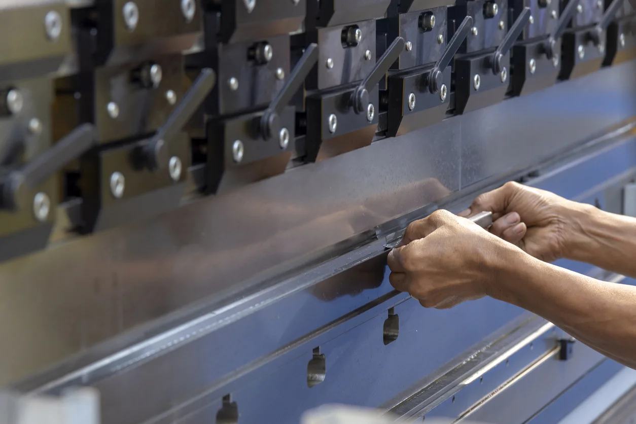 Bending metal with a press brake machine
