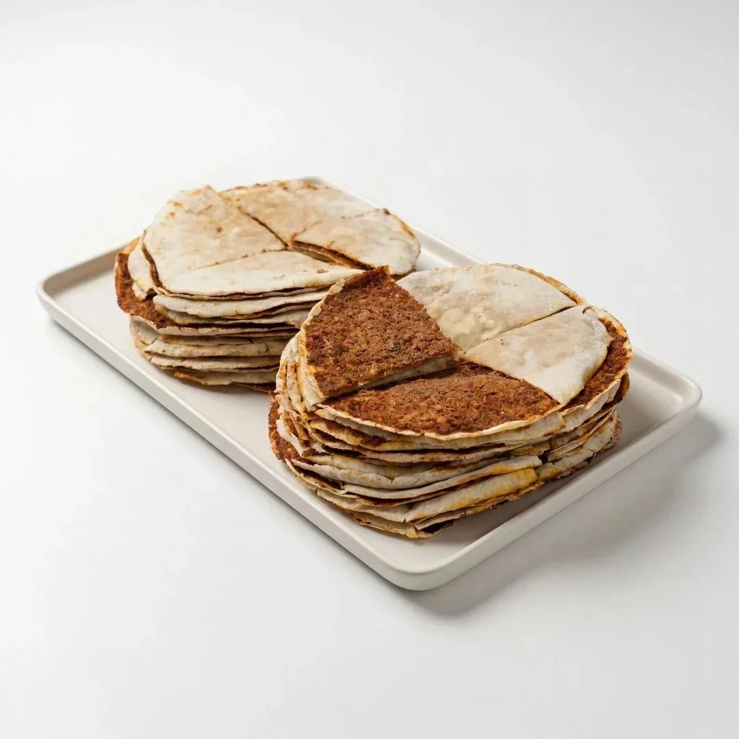 Lahmajoun Armenian meat flatbread stacked on catering tray — halal certified Armenian catering from ANI Catering Belmont Boston