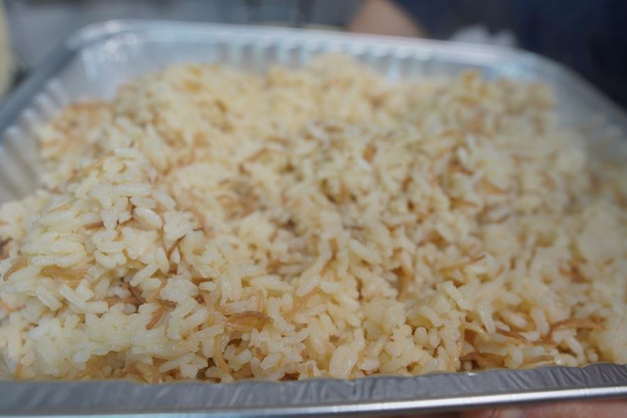 Fresh tray of Armenian rice pilaf being served at ANI Catering