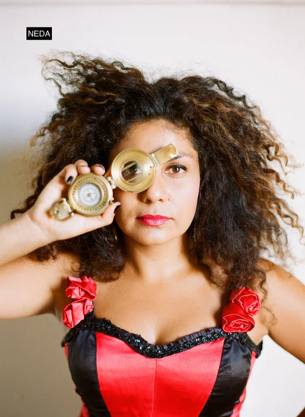 NEDA Inspired by the queens of carnival, Neda’s original music and live performances are a loving reveal of world pop electro, metallic percussion, grooves and songs written for generous live concerts. Her music has taken her on adventures with the time tested party band Tumbarumba. For nearly 2 decades they have been delivering their compositions & percussive beat laden concerts all over Australia showcasing Neda’s live performance carisma. Her second project is titled NEDA - All Colour Project. This band boasts her modern Afro-Brazilian rhythms and electro dance elements, all mixed in with her songs and dance choreography from her 18-piece ensemble. Neda’s career highlights include playing festivals and Melbourne’s largest venues with her original concerts several times over. Queenscliff Music Festival, Splendor, Blues & Roots, Federation Square New Years eve, Zoo twilights, Crown Palladium, Marvel Stadium, The Melbourne Exhibition Center, Margaret Court Arena, The Arts Center Melb, The MCG, Industry and street festivals and smaller boutique events. Neda has also guested/toured singing backing and playing for esteemed national and international projects - Havana Meets Kingston, The Congos (Jamaica), Prince Allah (Jamaica), Horace Andy UK (Massive Attack), Nicky Bomba, M.S.O, Grey Ghost, Mantra, Kylie Auldist, The Red Eyes, King Charlie’s School of Dub, Blue King Brown, Deline Briscoe, Daddy Cool and Randy Valentine Neda has made a lasting and ever expanding full time career out of her music and the delivery of her live concerts, she is known for her unique industry attitudes, vibrant stage presence, elaborate costuming, percussion skills and her ability to connect the audience to instant intense partying.