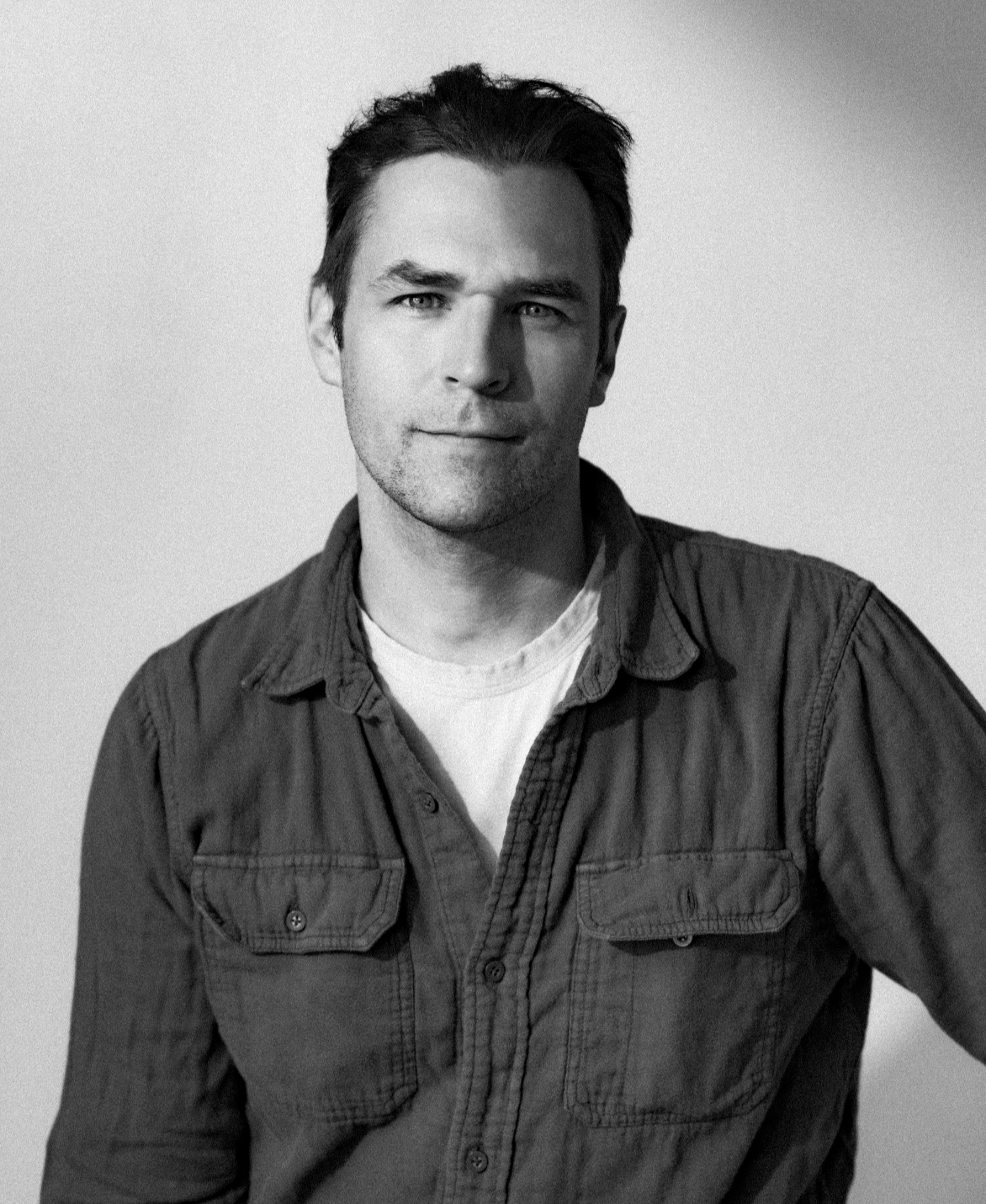 Black-and-white portrait of director, cinematographer and photographer Aaron Wenck.
