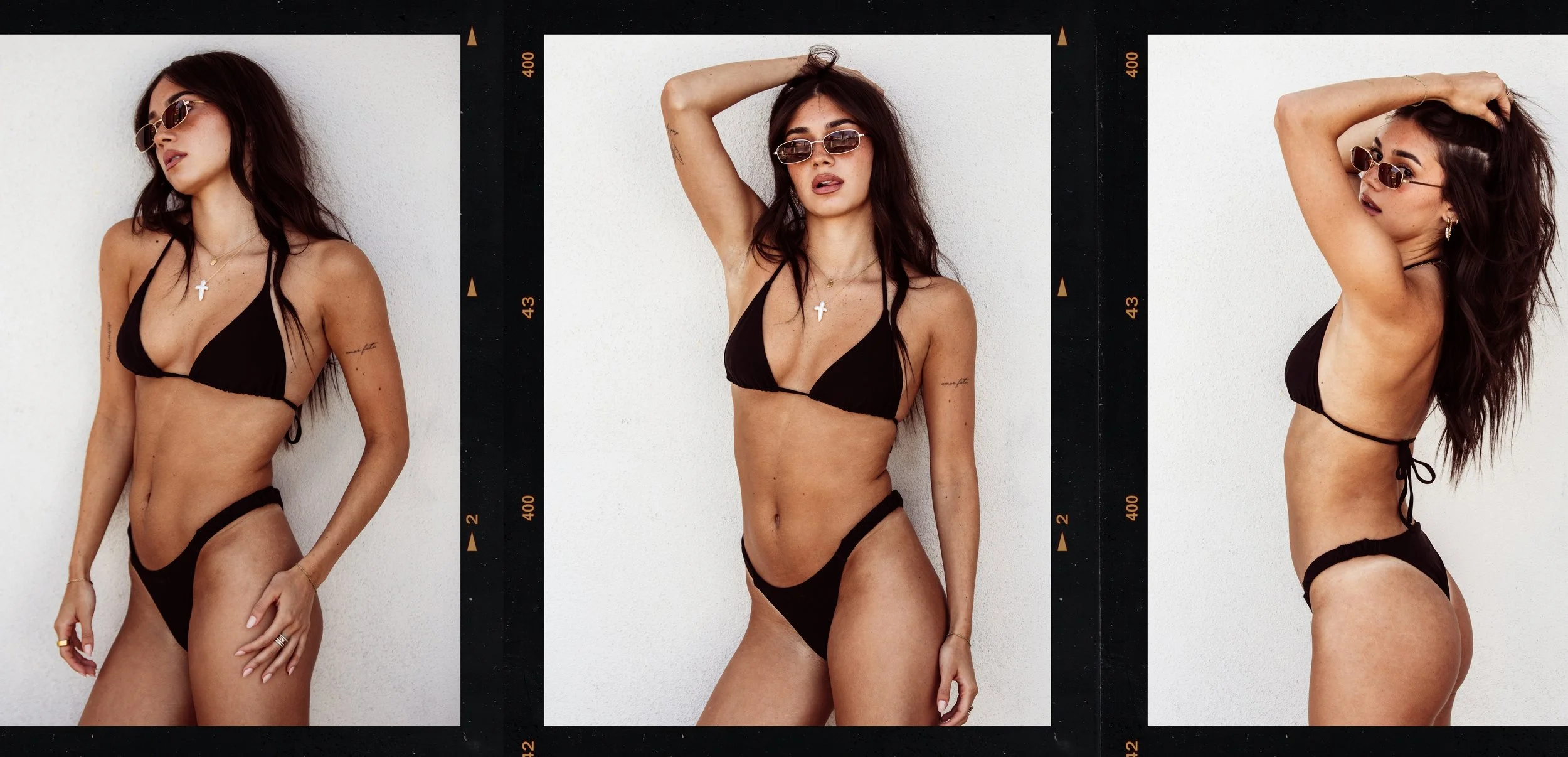 A young woman with long dark hair posing in a black bikini against a white wall, wearing sunglasses and jewelry, captured in a series of three photos.