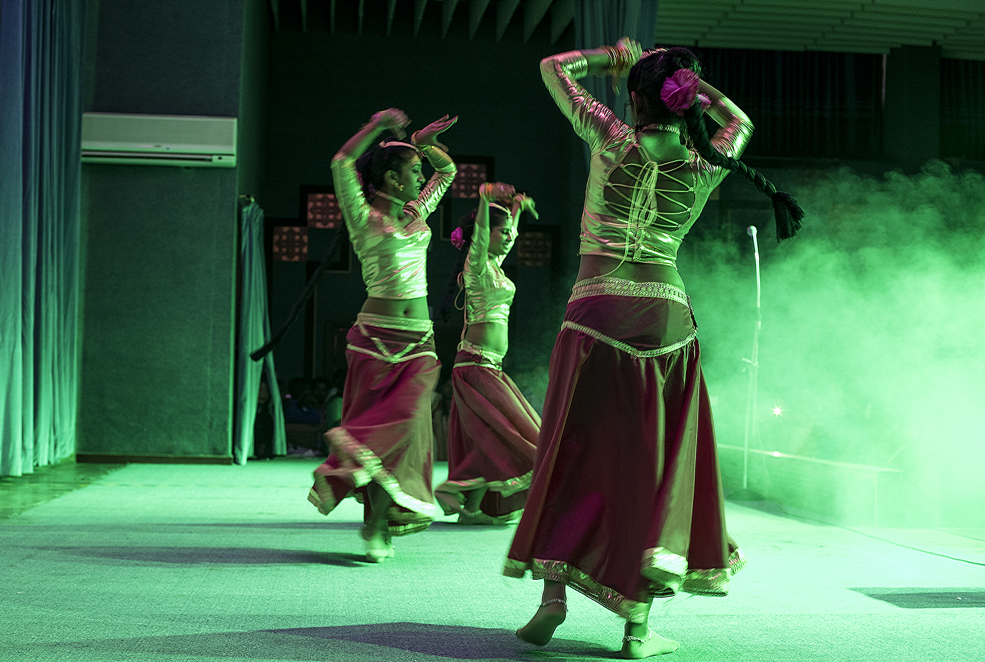 Sri Lankan workers perform a traditional dance. 