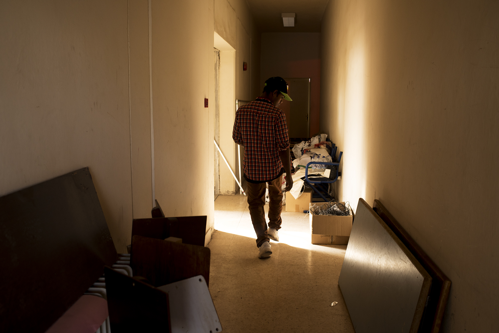 A Nepalese worker practices his routine backstage.
