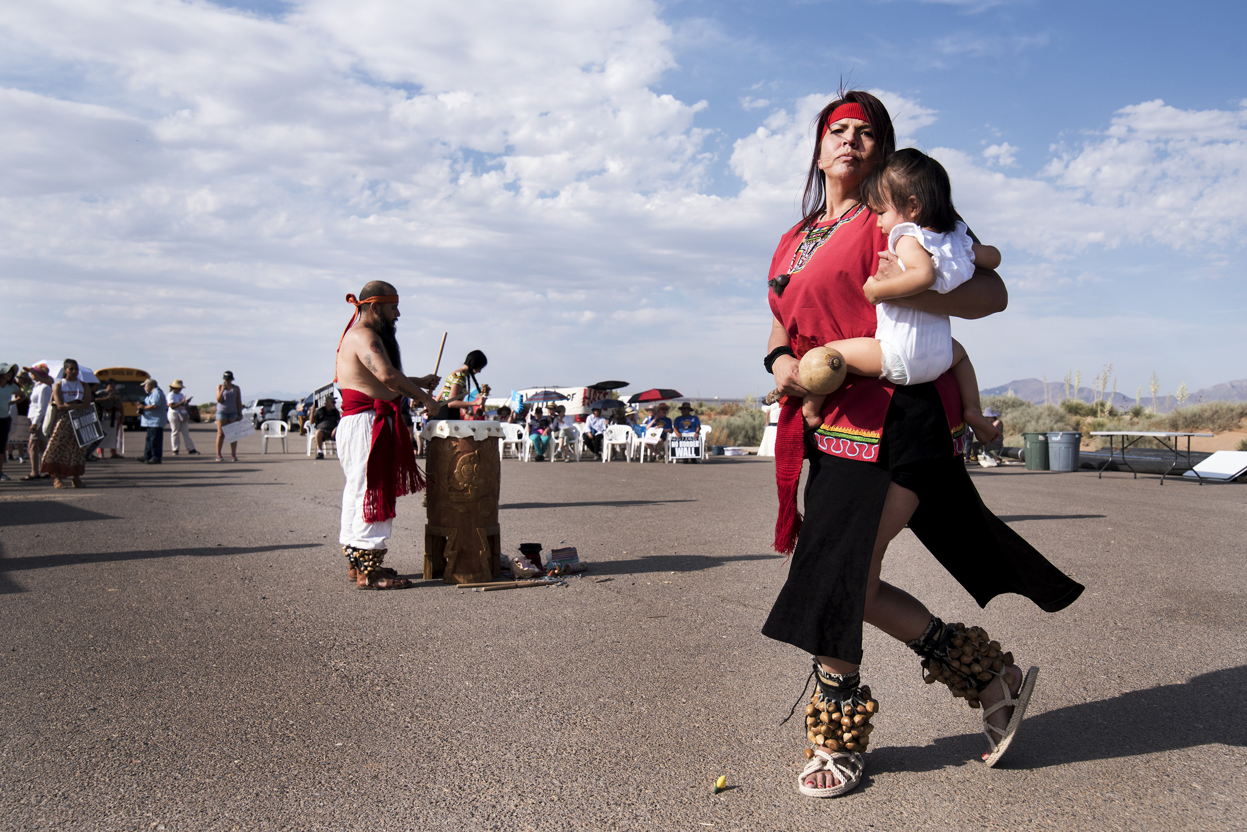 An Aztec performance group from El Paso, Texas performs a few paces from New Mexico’s Santa Teresa Port of Entry during a demonstration against new border wall construction. June 2018.