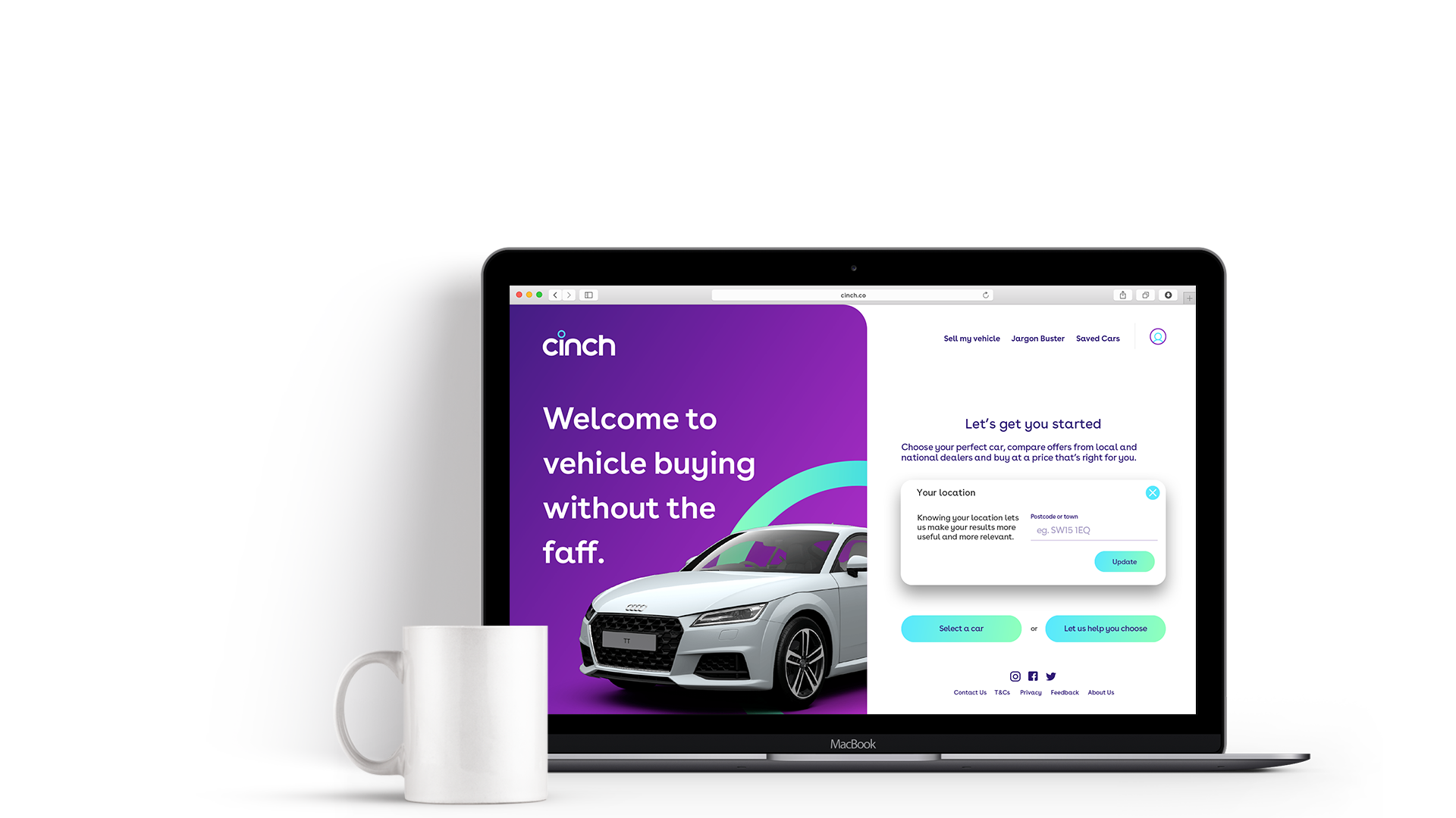 MacBook laptop on white surface, displaying a car buying website with a silver car on review, purple background, website navigation, and location input prompt. White mug next to the laptop.