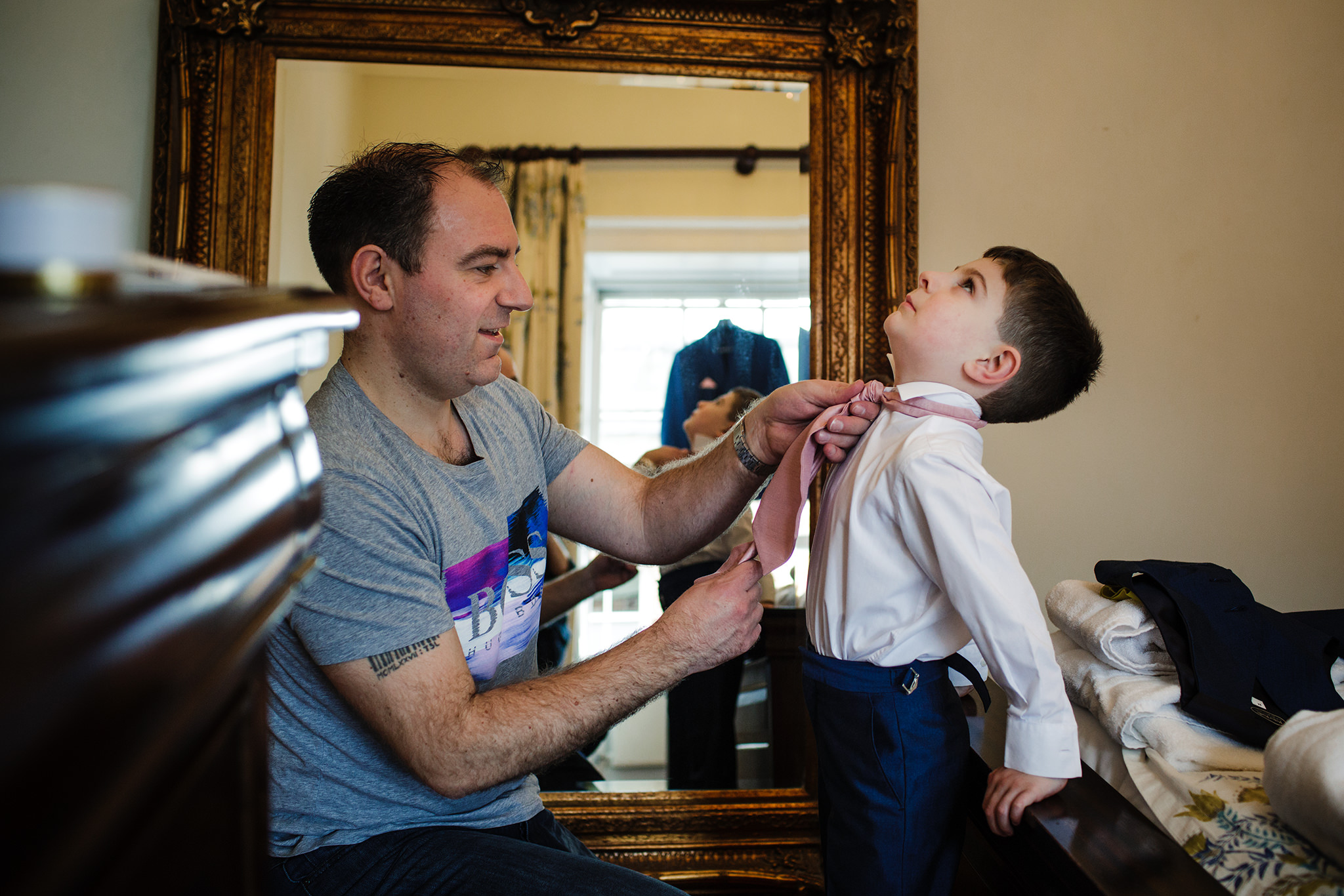 Groom and pageboy wedding preparations at botleys Mansion