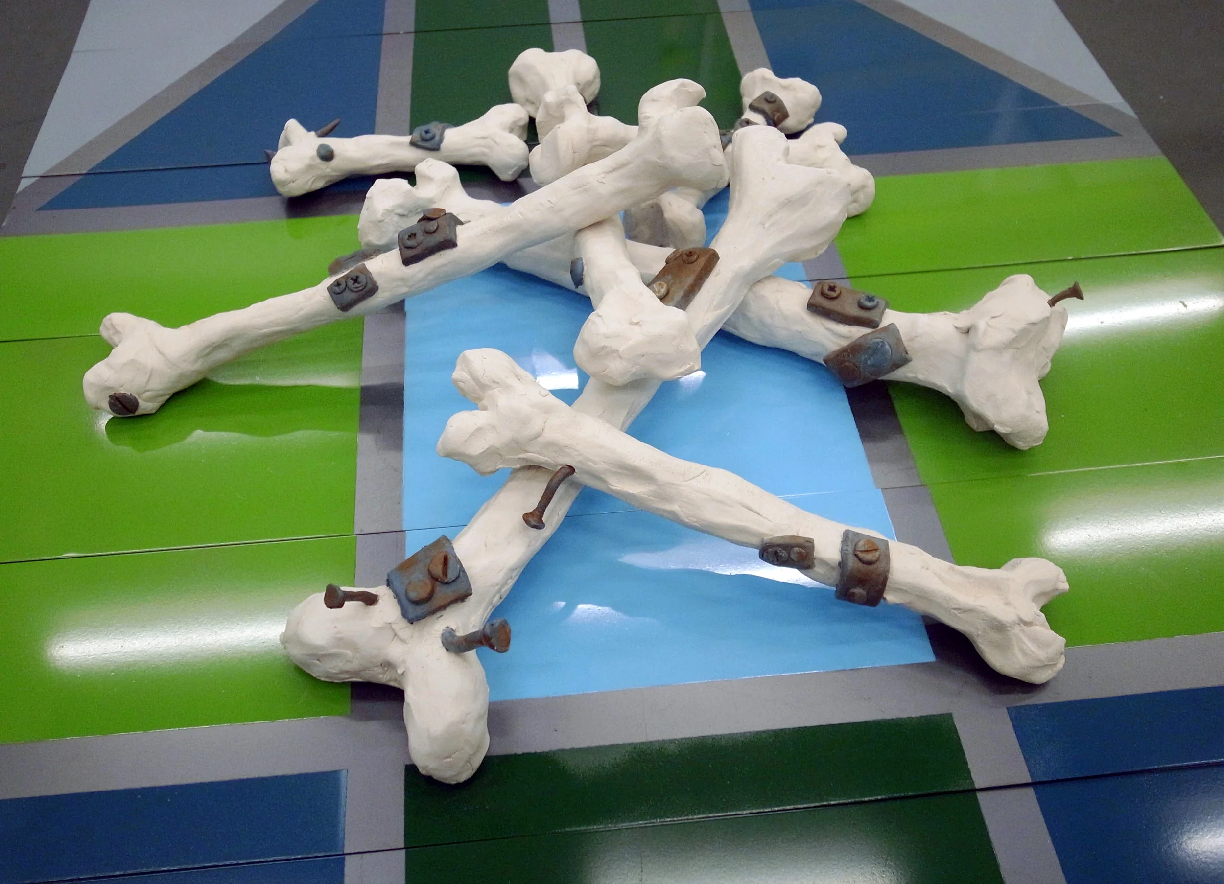 Close up of artist Matti Isan Blind' sculpture- Fun-Time Receptacle, 2011. Fired clay, acrylic paint, dimensions variable.