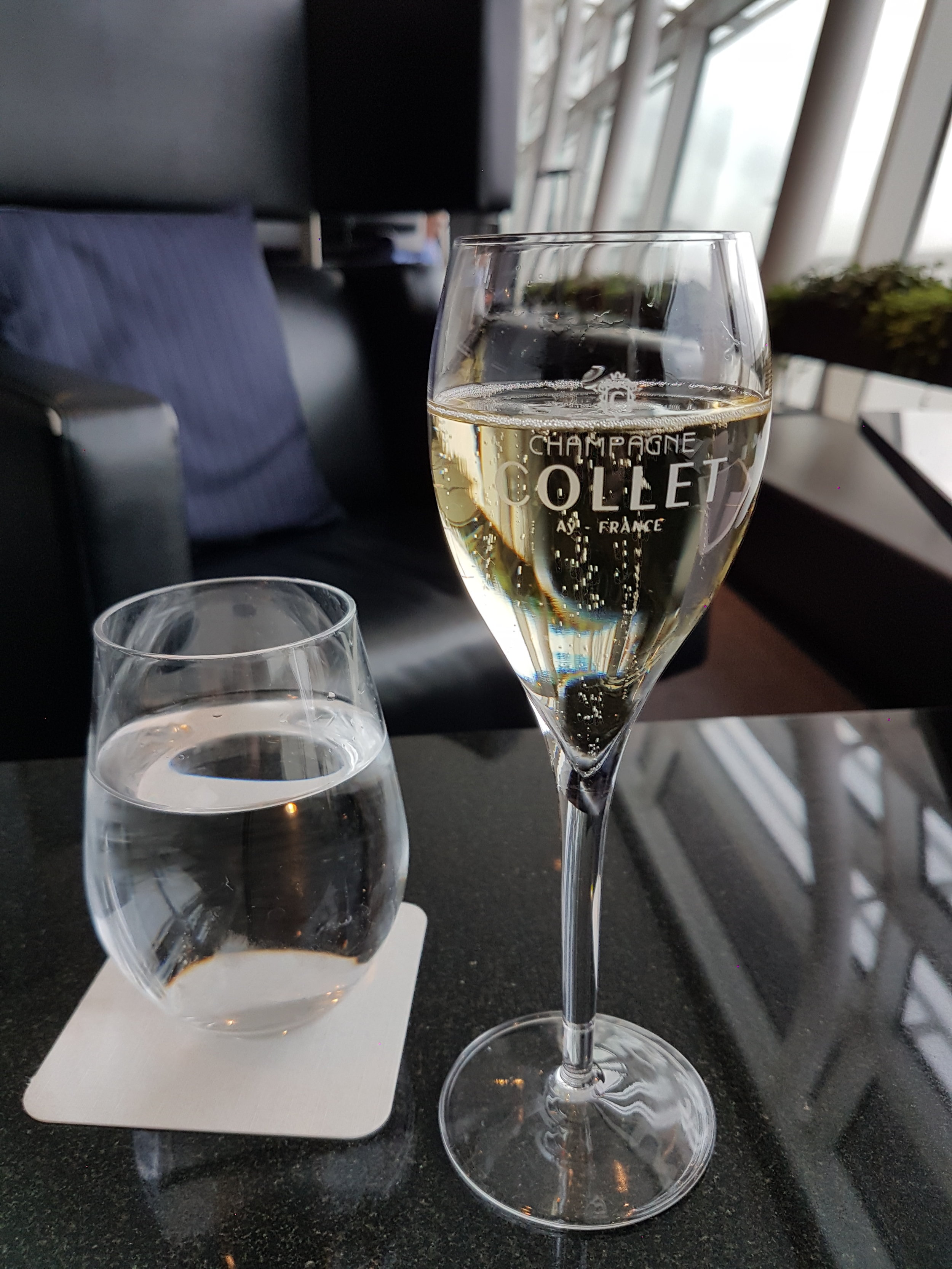 A warm welcome by the reception desk and escorted to a seating area and a champagne glas 