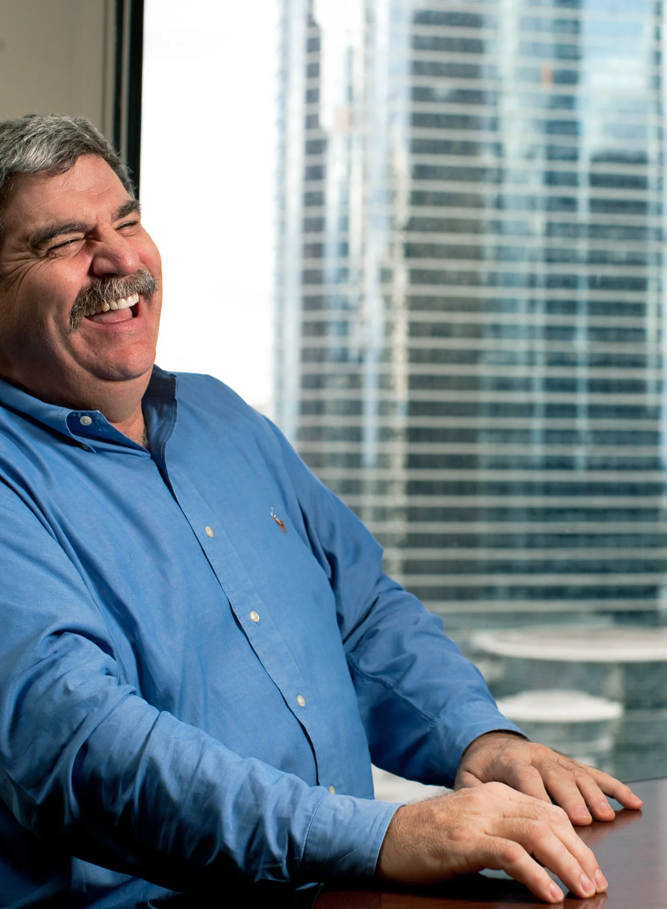 28_James-Robinson_Corporate__Fat_laughing-exec_blue-oxford-copy.jpg