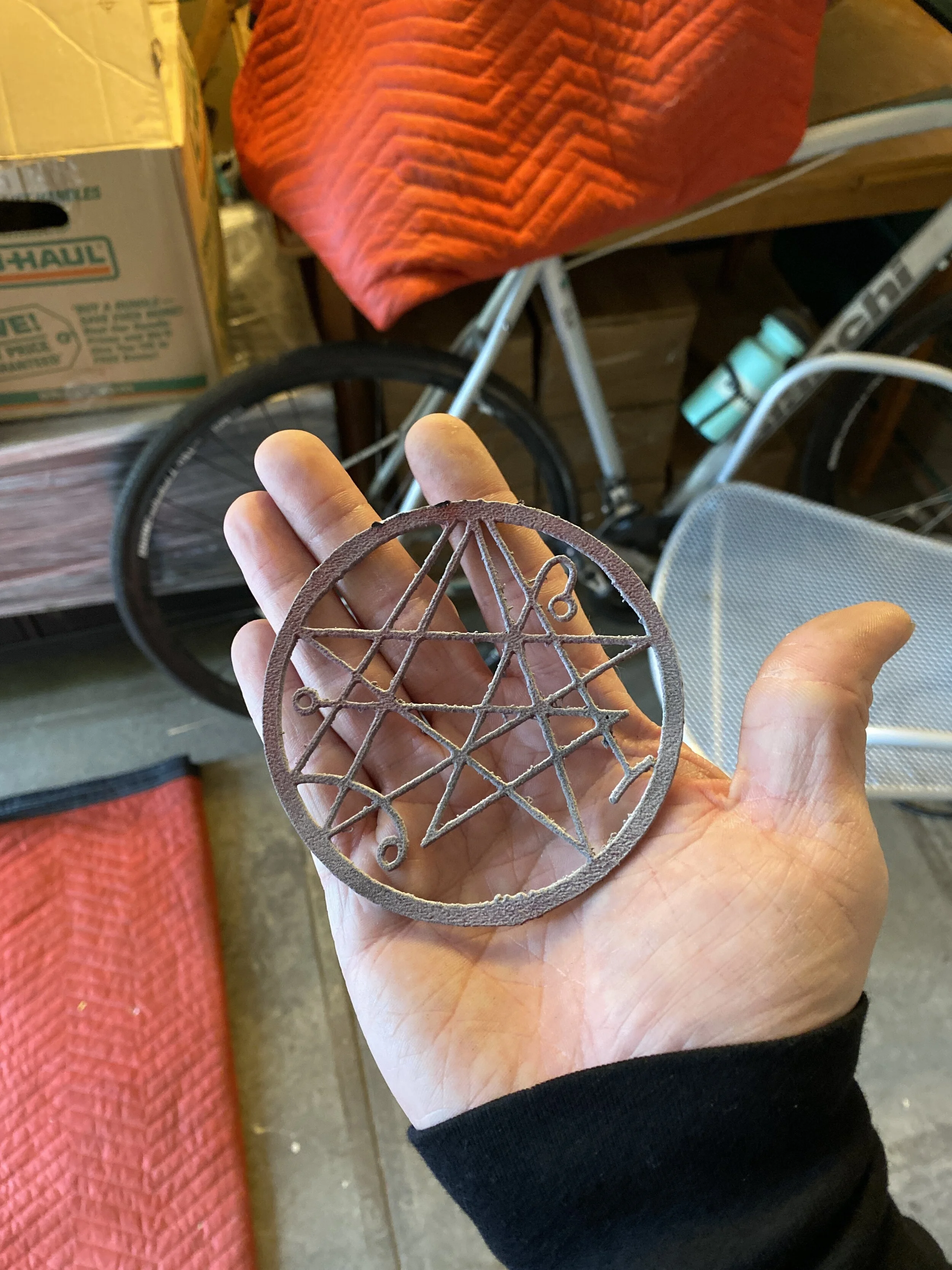 Laser Cut Necronomicon stencil from vectored drawing 