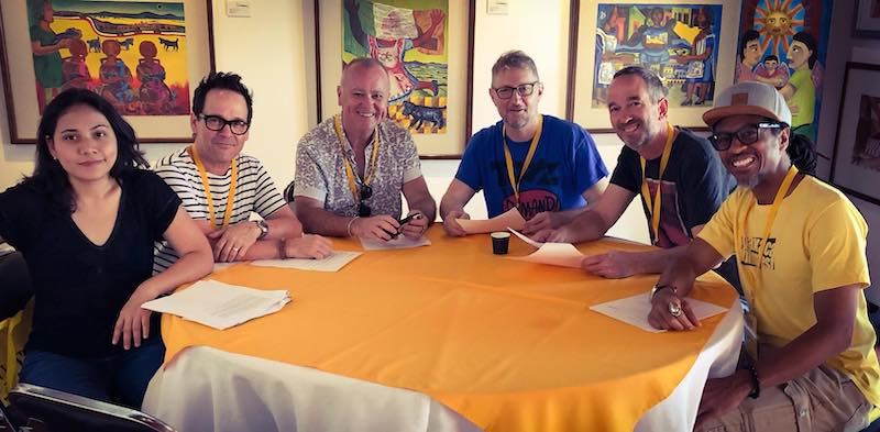 The moderators meet—and yes, the tables really are round! L-R Brenda Medina, Charles Lane, Ron Leach, Ian Keldoulis, Dave Ryan, Mateen Kemet.