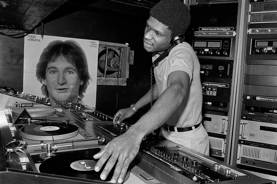 DJ Larry Levan at Paradise Garage, New York, 1979. Photography by Bill Bernstein. From the book 'Disco: The Bill Bernstein Photographs' (Reel Art Press, London 2015) discobillbernstein.com