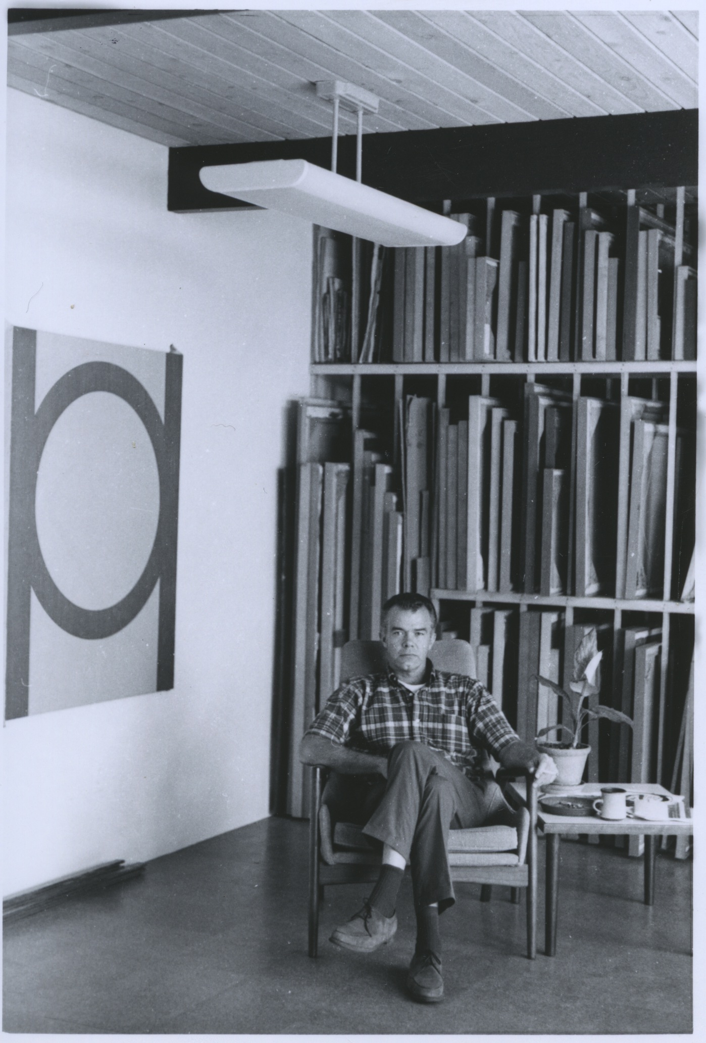 Karl Benjamin in his studio with "#18", 1964.