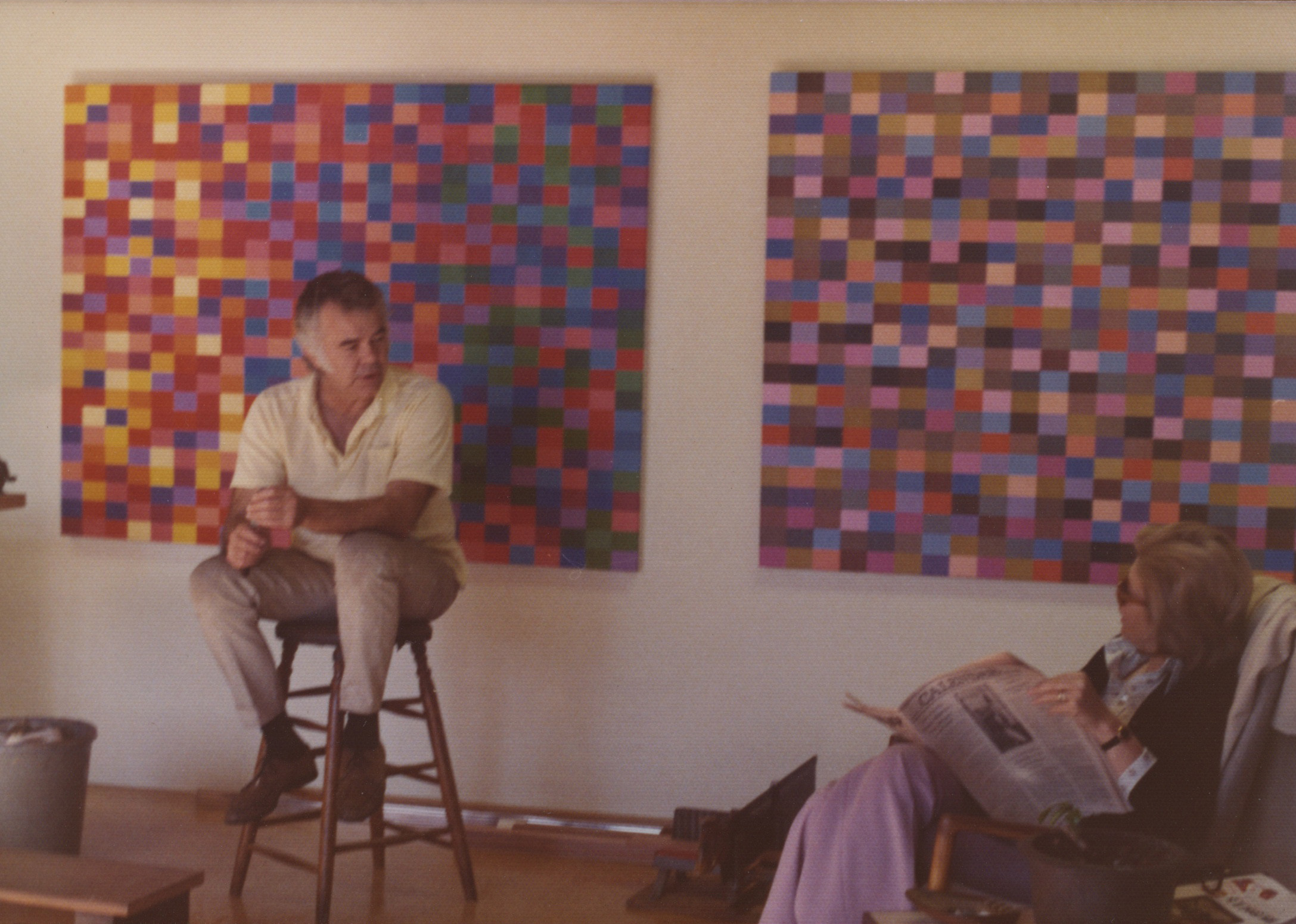 Karl Benjamin in his studio with sister Ruth Paris, circa 1972.