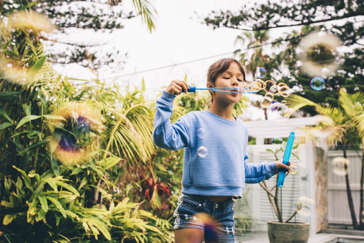 blowing bubbles by AzmanL iStock-628508880.jpg .jpg