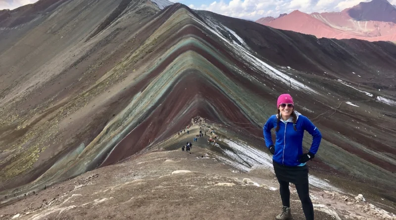 Rainbow Mountains in Peru. My hands were cold, so the pockets in the skirt helped me keep them warm.