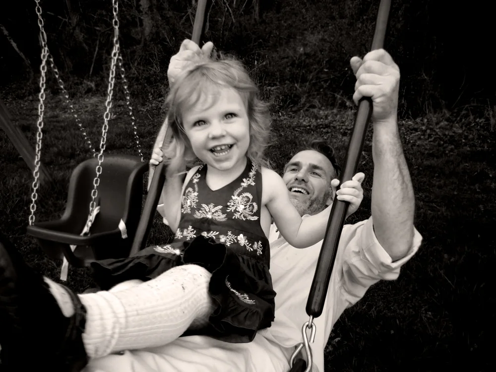 My late "Uncle" Colin Devlin, an NYC restaurateur, with his daughter Lulu on their farm in Pennsylvania, Easter 2011. 