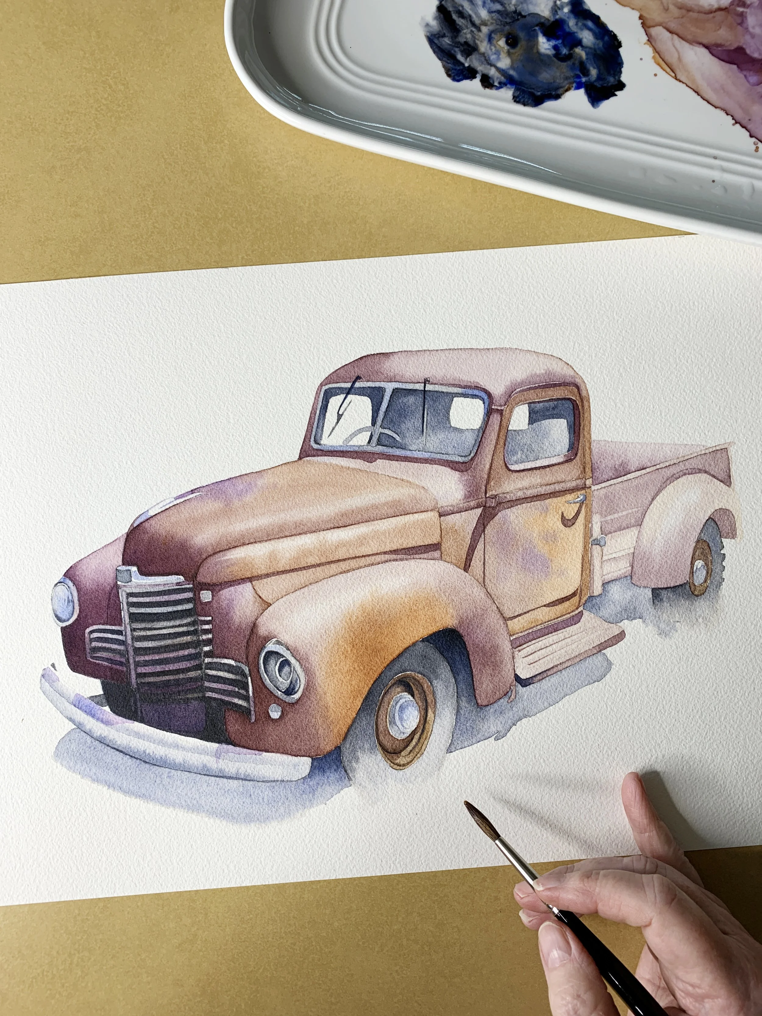 Finished watercolour painting of a vintage pickup truck with layered glazing, shadows and refined highlights.