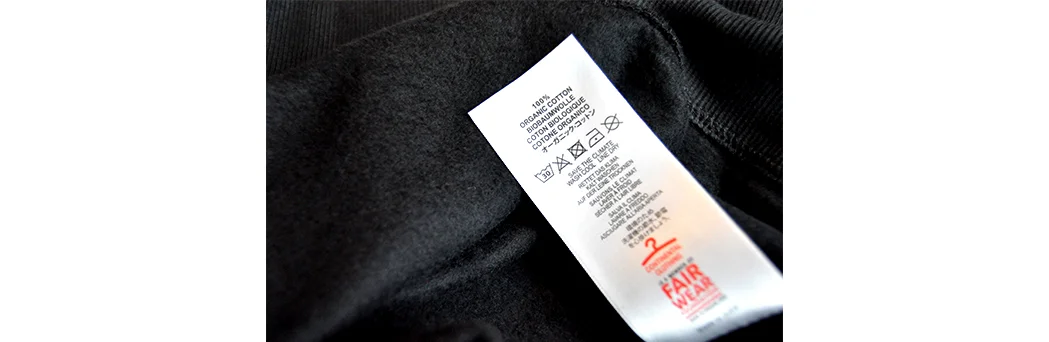Label from our black organic cotton sweatshirt