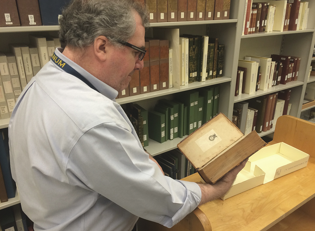 Ed Redmond with the Jefferson gazeteer. elliot carter photo