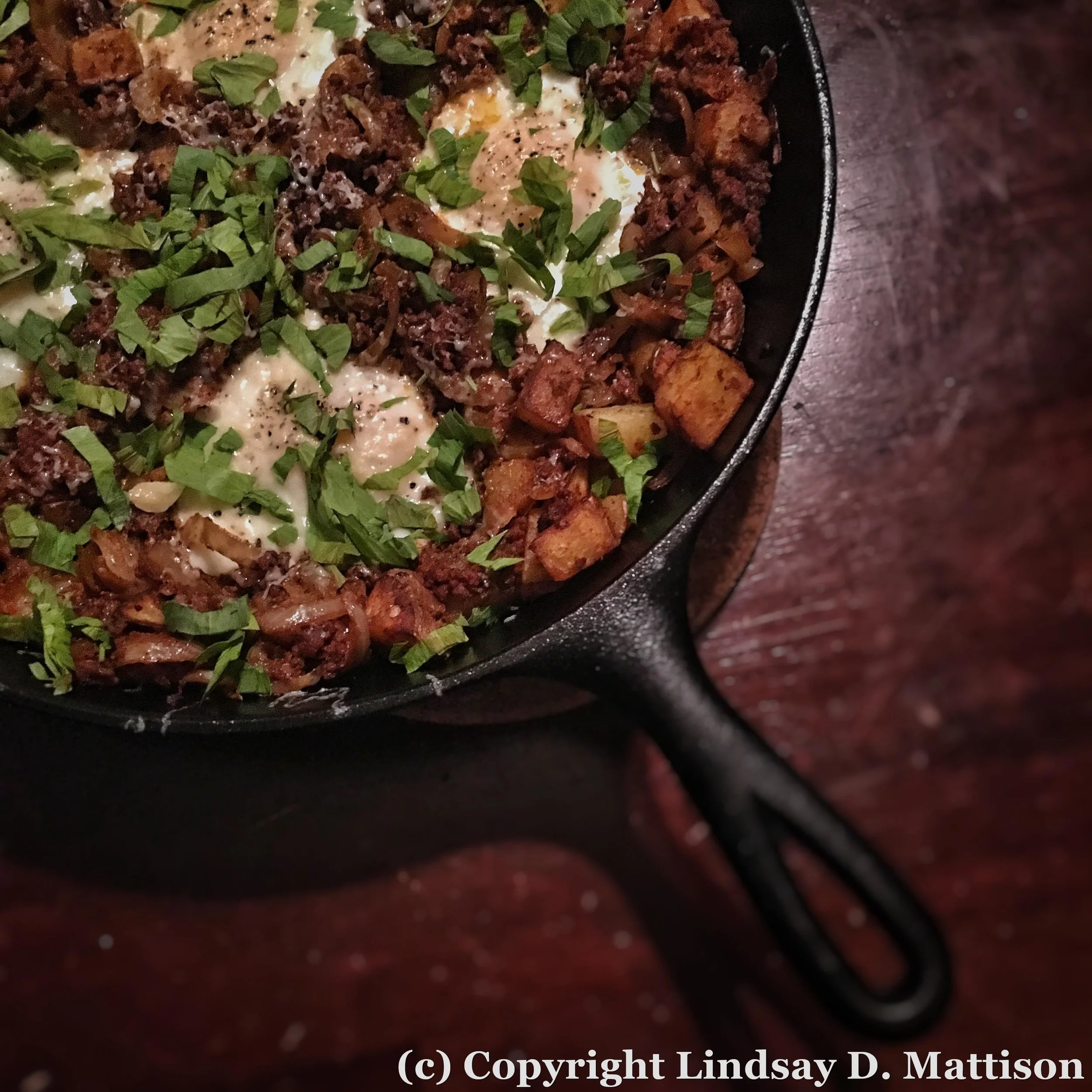 Baked eggs are my favorite way to feed a crowd for breakfast! Simple and easy: just cook your hash, make some pockeets for the eggs, and bake away until the whites are set!