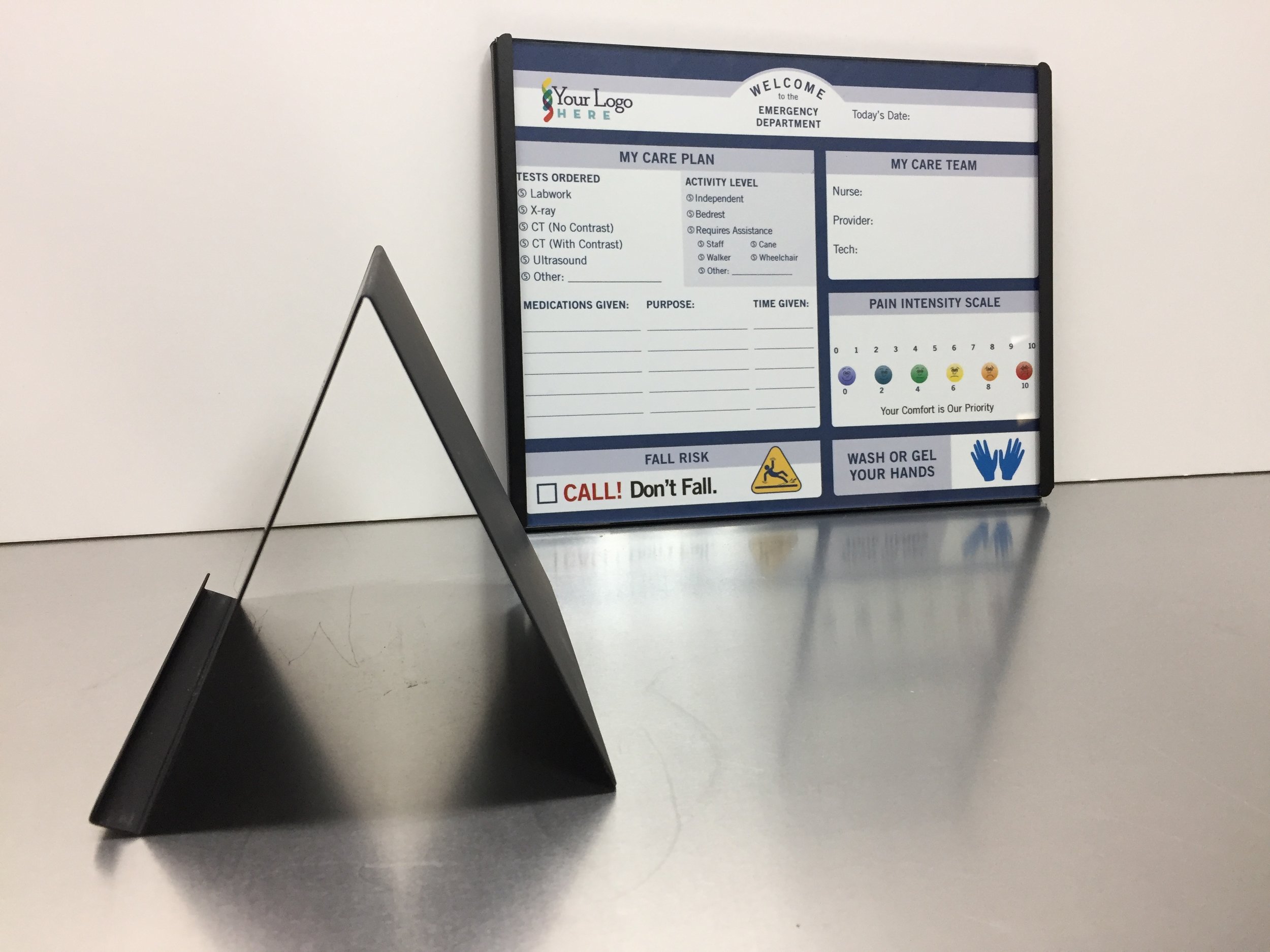 IDCS offers two ranges of customizable bed side boards. These are a smaller version of our wall-mounted boards with the same superior custom design and functionality. They can be positioned bedside on a shelf or cabinet and are ideal for NICU and PICU applications and often are used in combination with more general purpose wall-mounted boards and are fully portable. Our new dry-erase bedside freestanding communication boards available in 11" x 8.5" (shown) and 11" x 17". Available in portrait (shown) and landscape orientation.