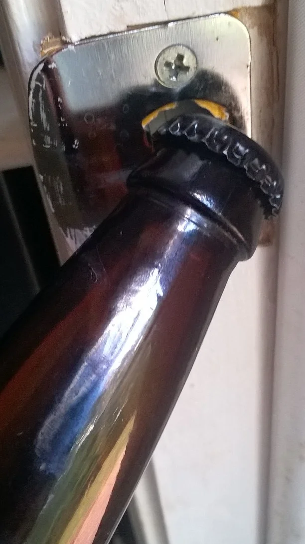 This looks like I'm forcing a little cyclops to drink a beer.