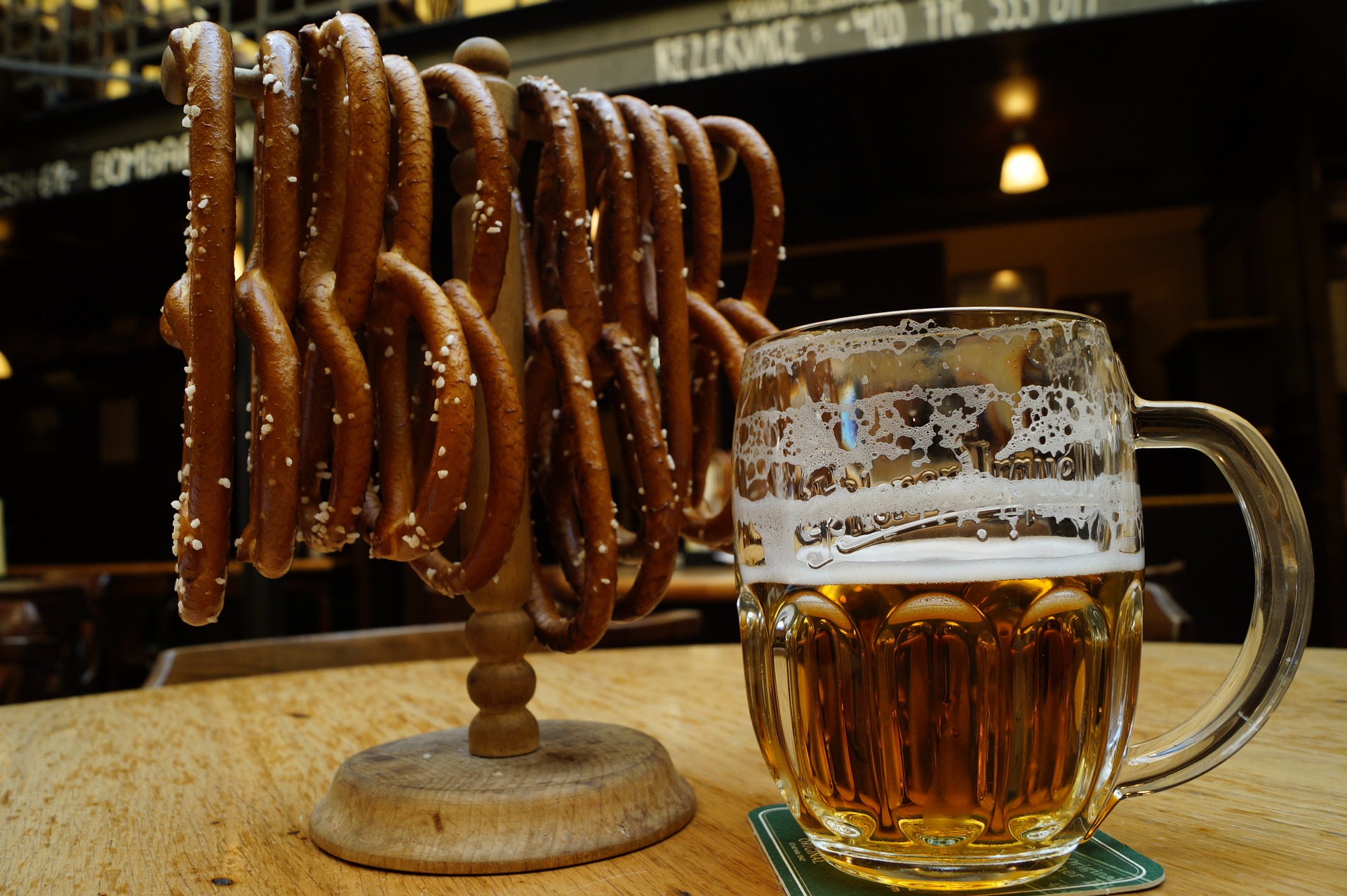 German pretzels with dimpled mug of golden beer