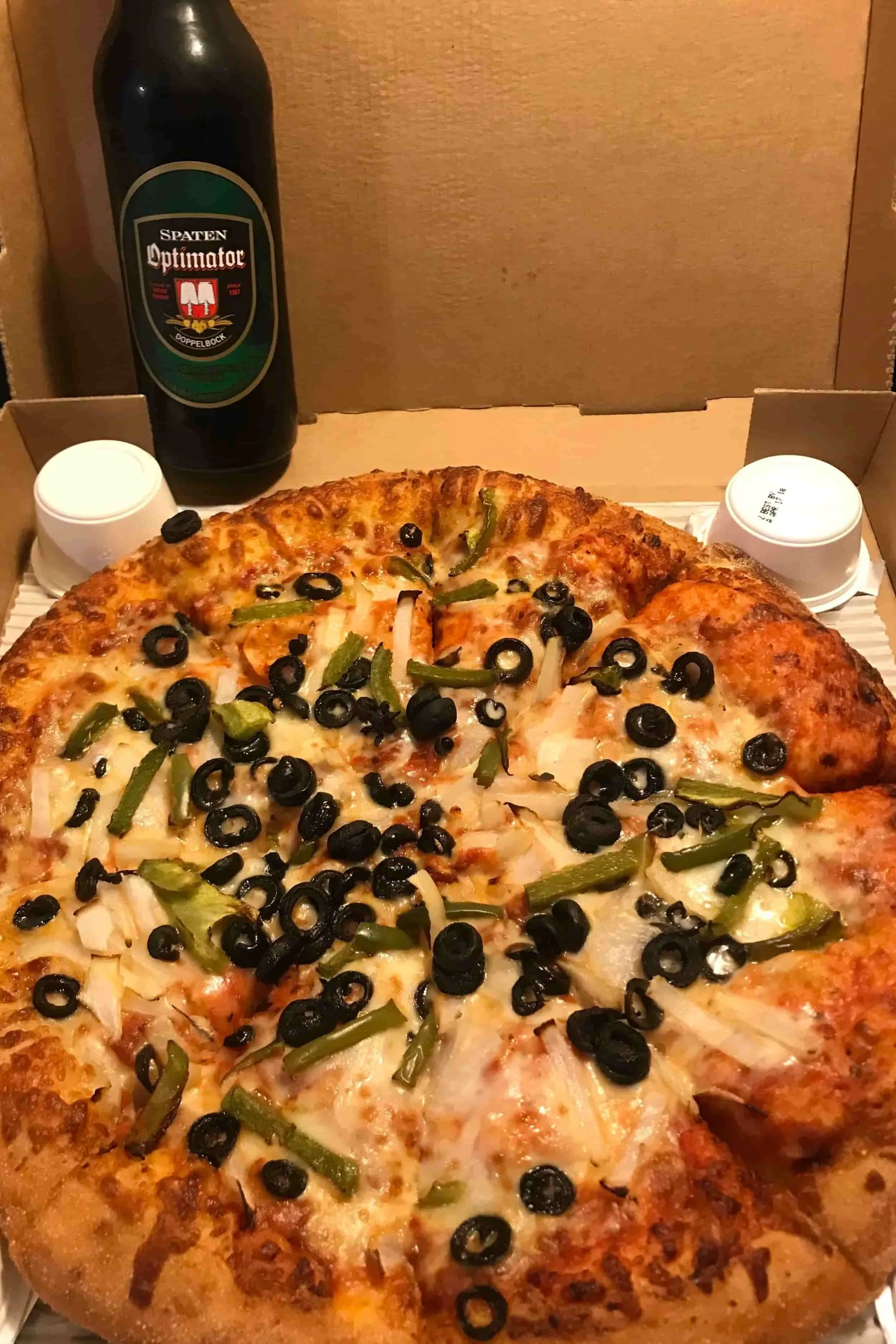 Close up food pairing ideas featuring Doppelbock beer with pizza