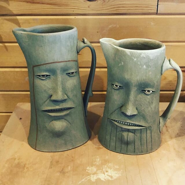 Just finished up a couple foot tall pitches. Getting ready to wood fire soon. #ceramicpitchers #wheelthrownpottery #wheelthrownceramics #wheelthrownandaltered #facepots #figurativeceramics #stoneware