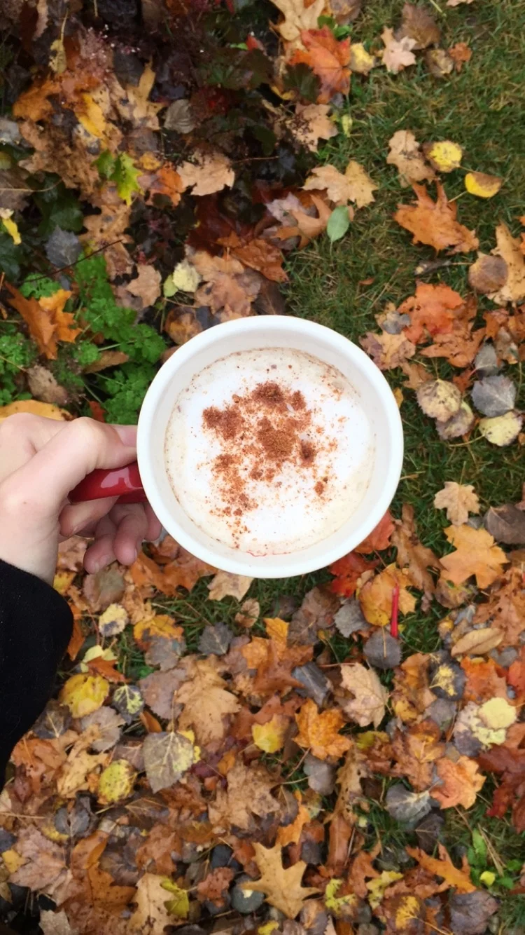 Enjoying a homemade PSL (Pumpkin Spice Latte) outside on a crisp autumn morning.