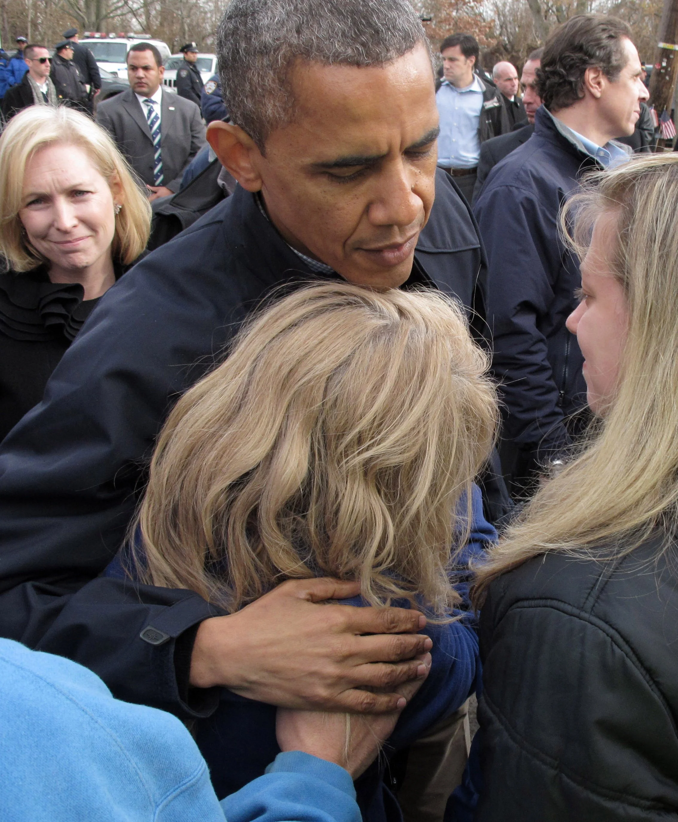  President Barack Obama embraces New Dorp Beach resident Diane Camerada Thursday, Nov. 15, 2012, in Staten Island, N.Y.  