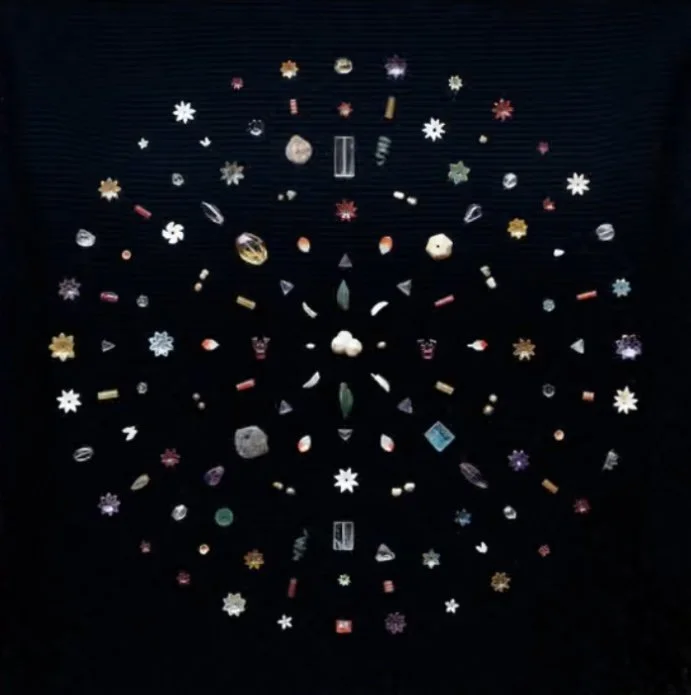 Relics of the Buddha are arranged in the shape of a beautiful cosmic mandala