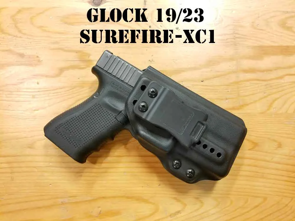 glock19-glock23-surefirexc1-xc1-surefire-kydex-holster-black-m2ch-made2carryholsters-g19xc1cs.jpg