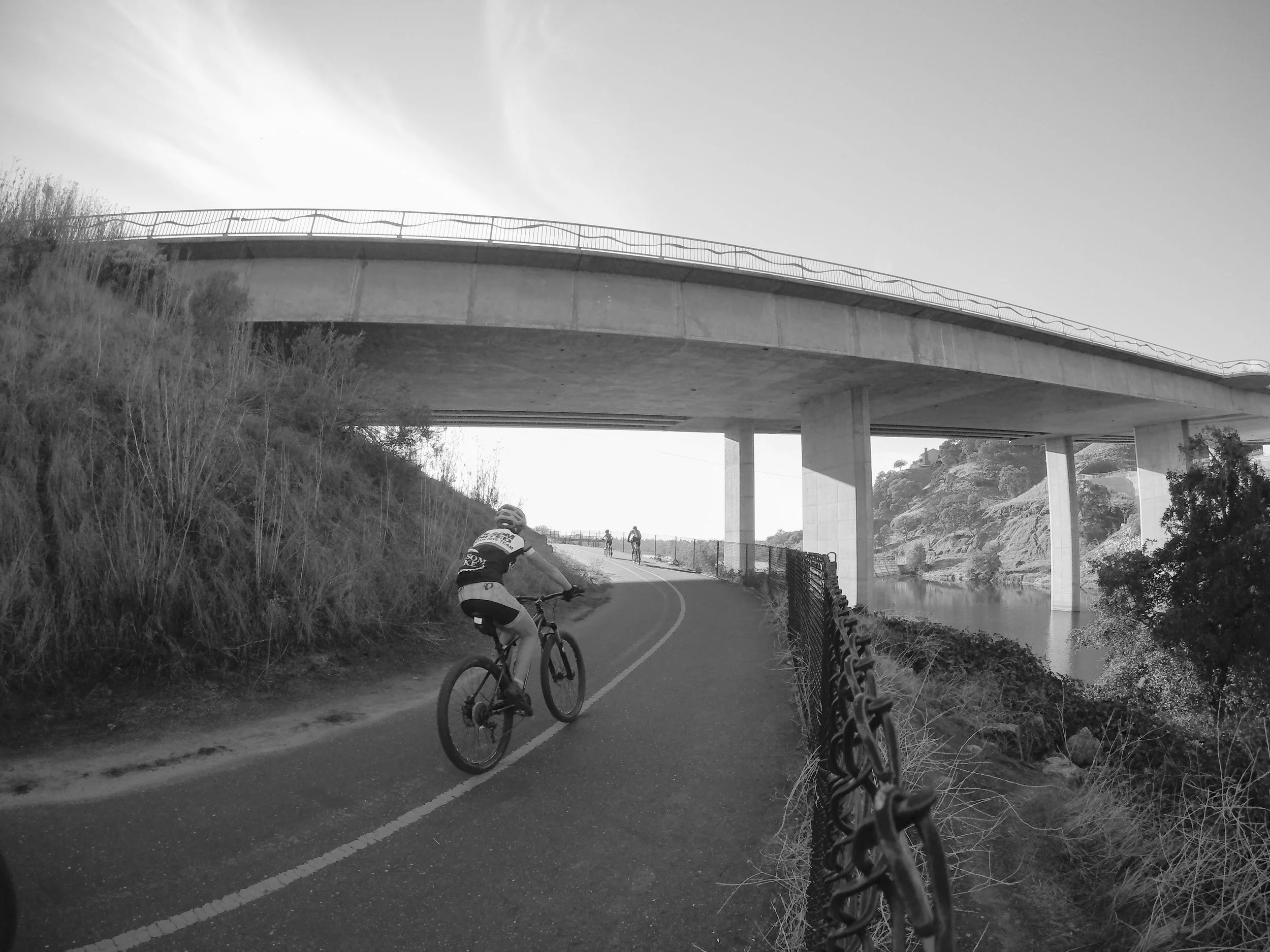 Biker riding underneath the Hazel Bridge